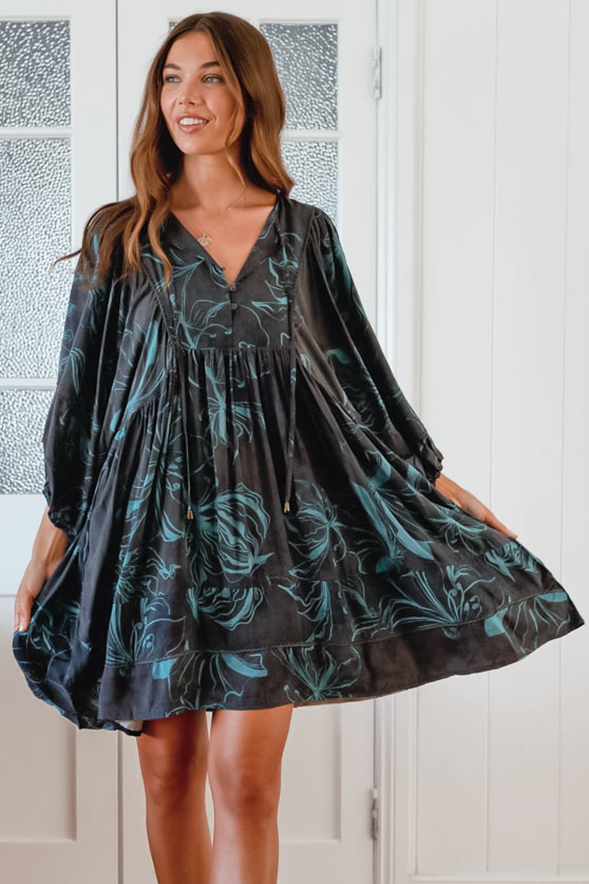 JAASE - Adela Mini Dress: Oversized Smock Dress with Batwing Sleeves in Midnight Lilly Print