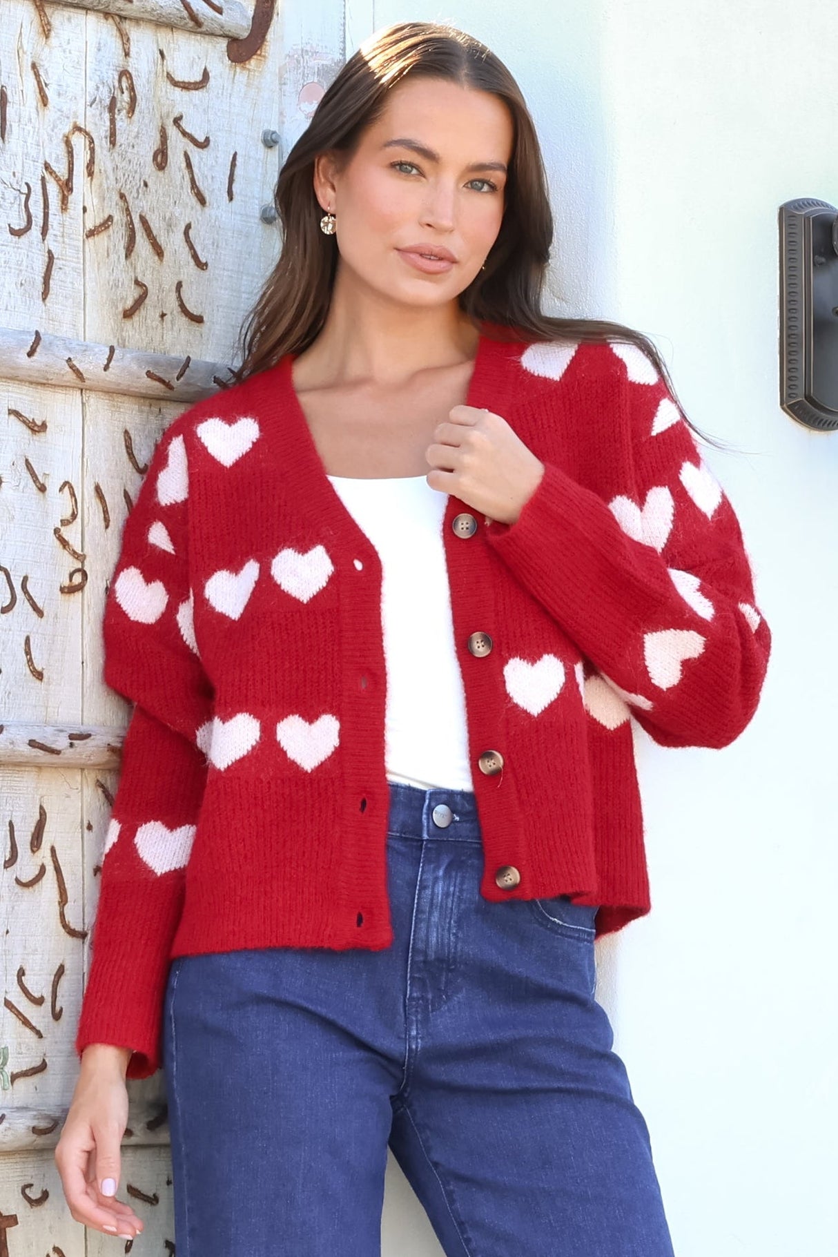 Model wearing Allaria Cardigan in Red from Salty Crush