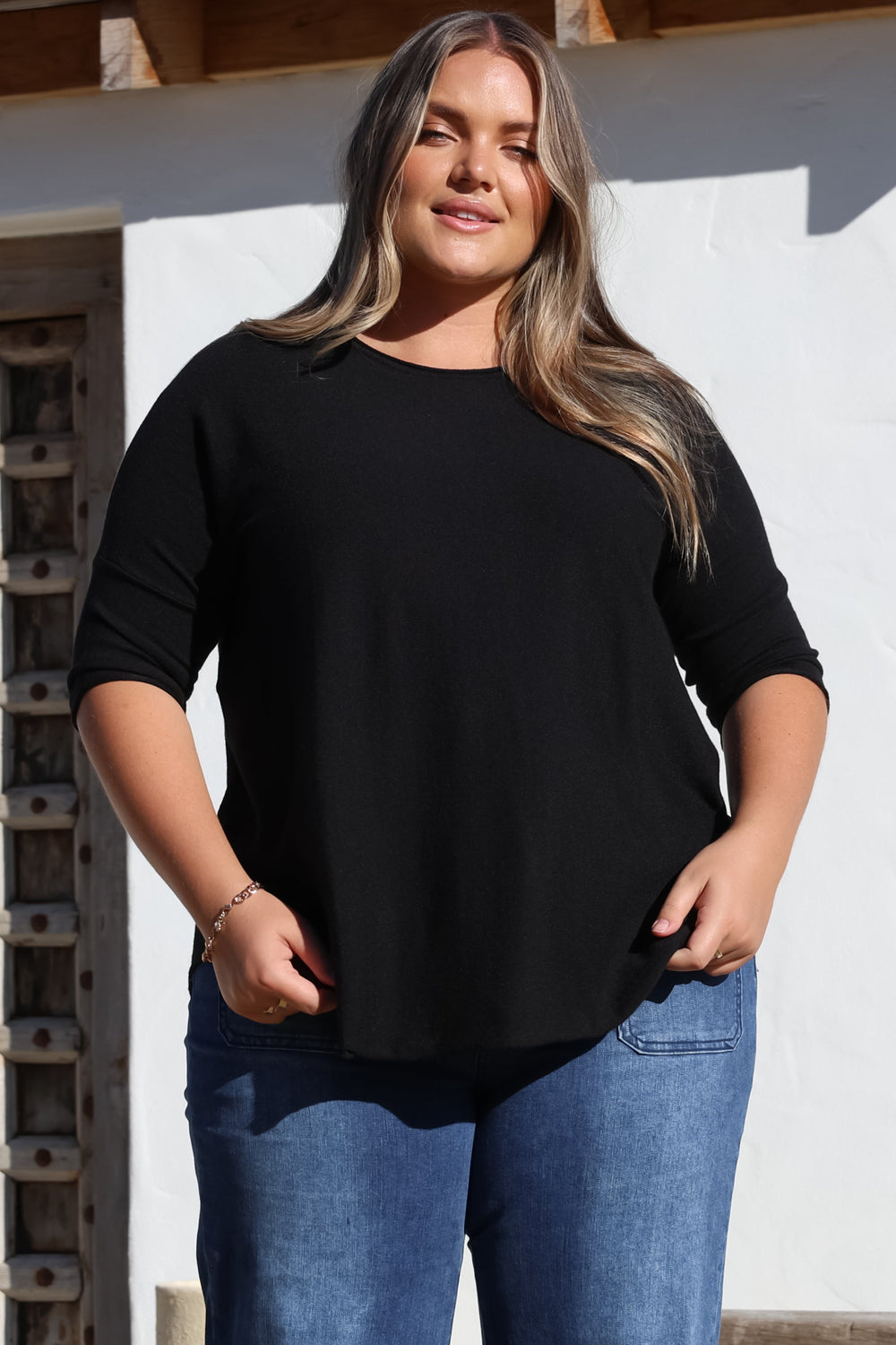 Allegra Knit Top - Crew Neck Curved Hem Box Silhouette Top in Black