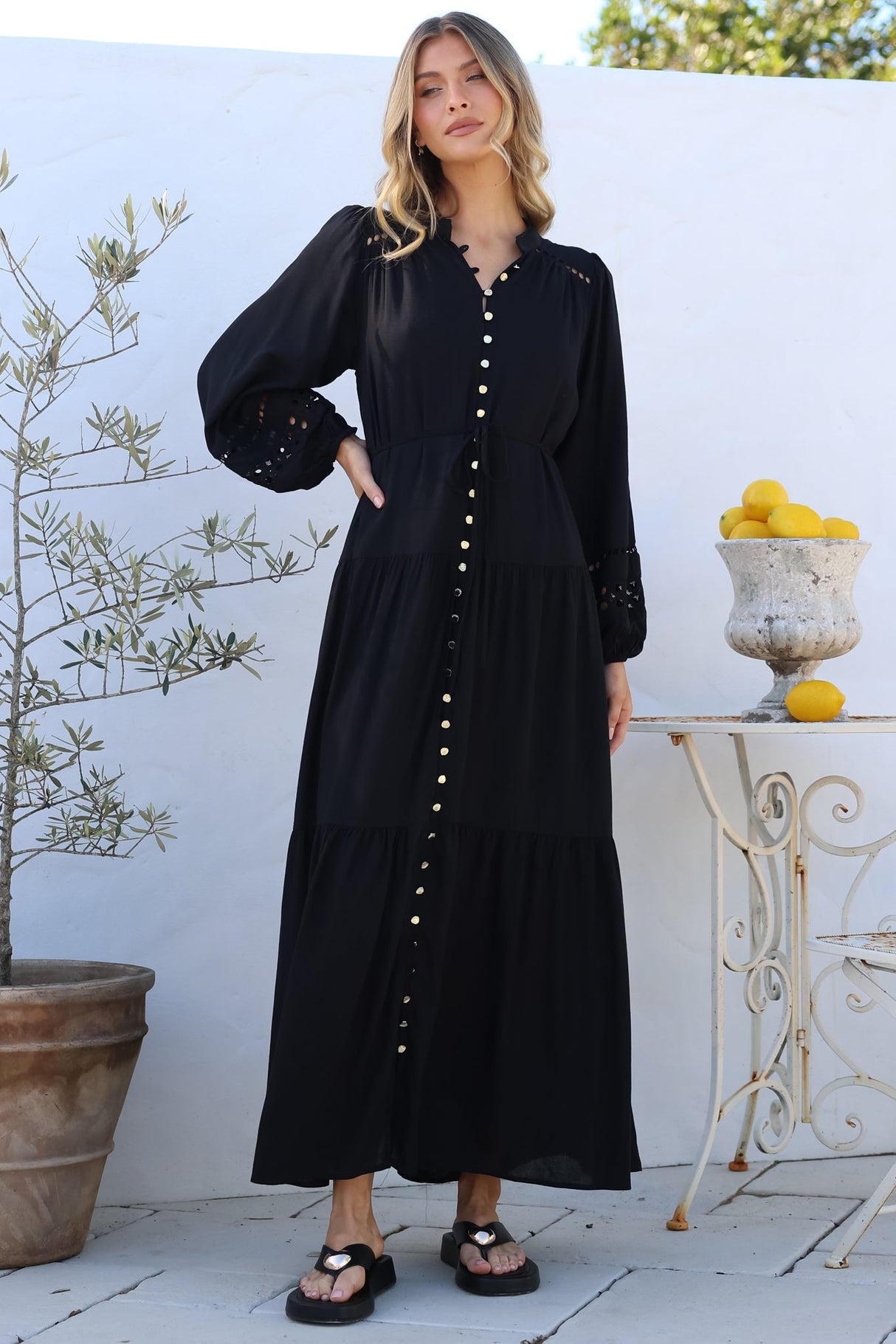 Model wearing Alyce Maxi Dress in Black from Salty Crush