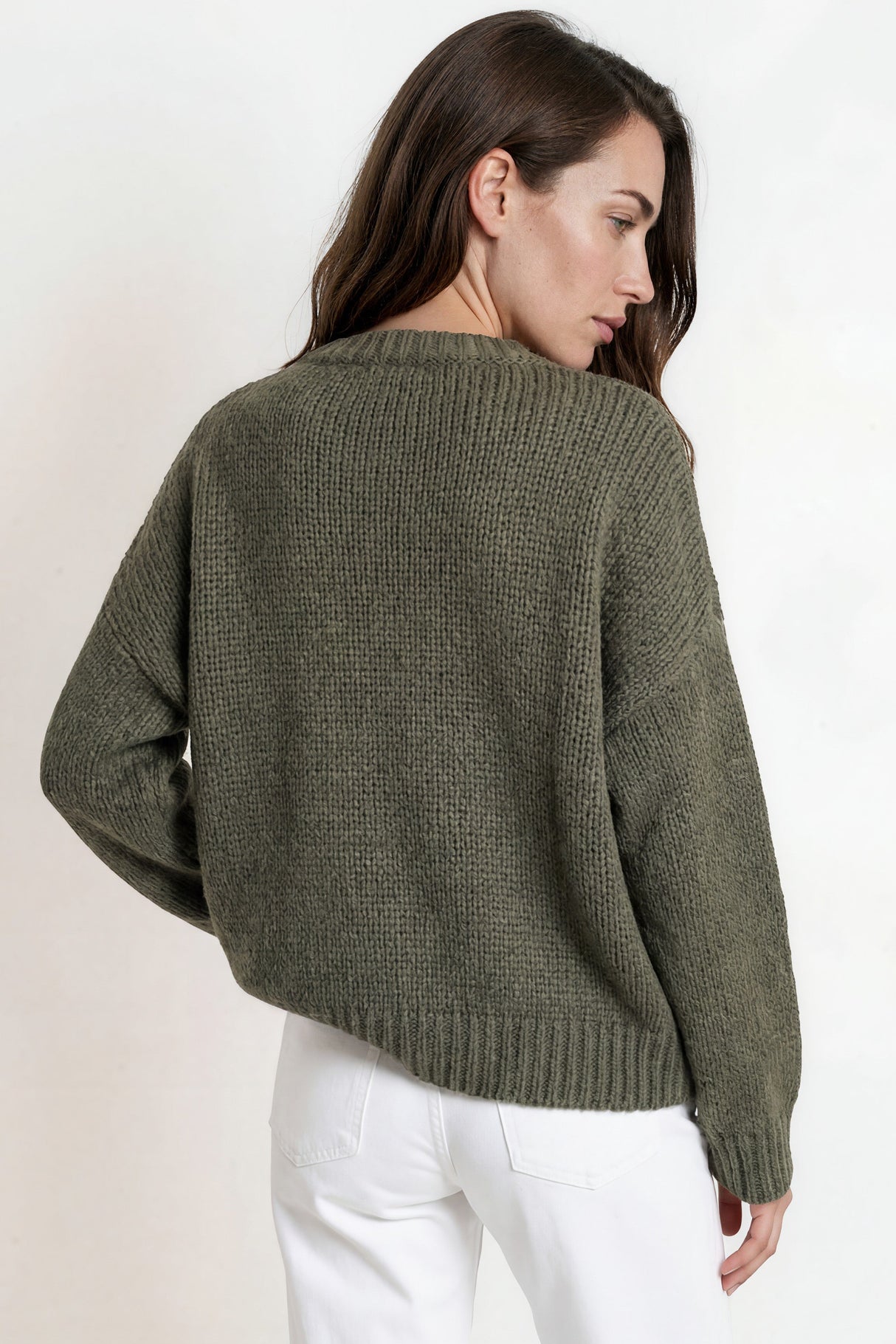 Model wearing Amara Jumper in Khaki from Salty Crush
