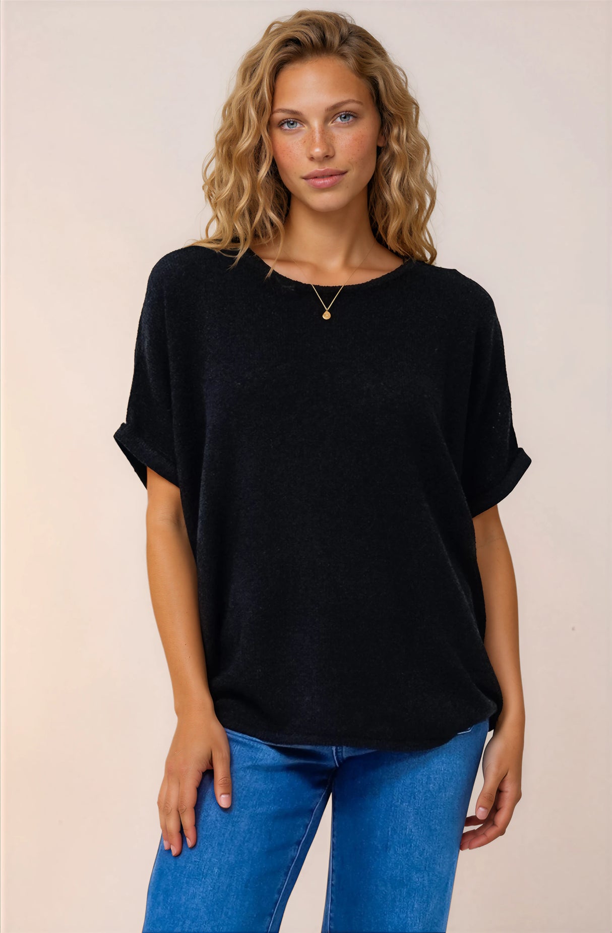 A model smiling wearing Andre Top n Black from Salty Crush