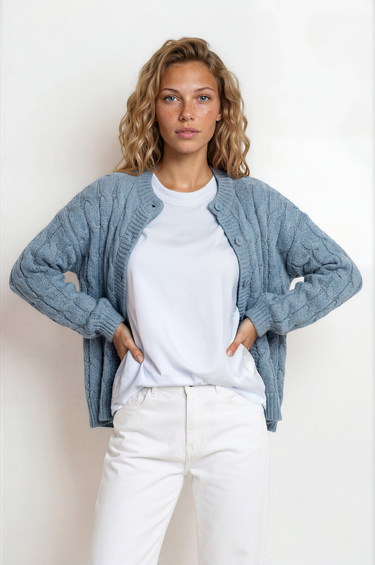 Model wearing Aspen Cardigan in Blue from Salty Crush