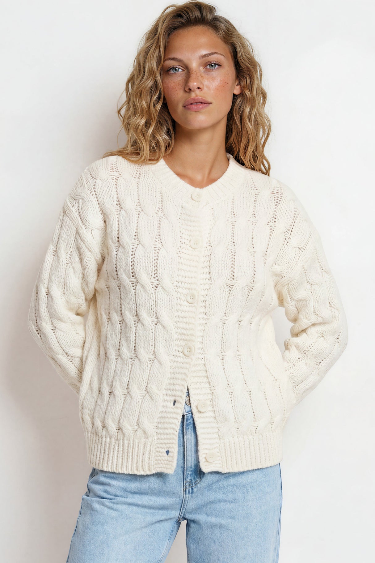 Model wearing Aspen Cardigan in Cream from Salty Crush
