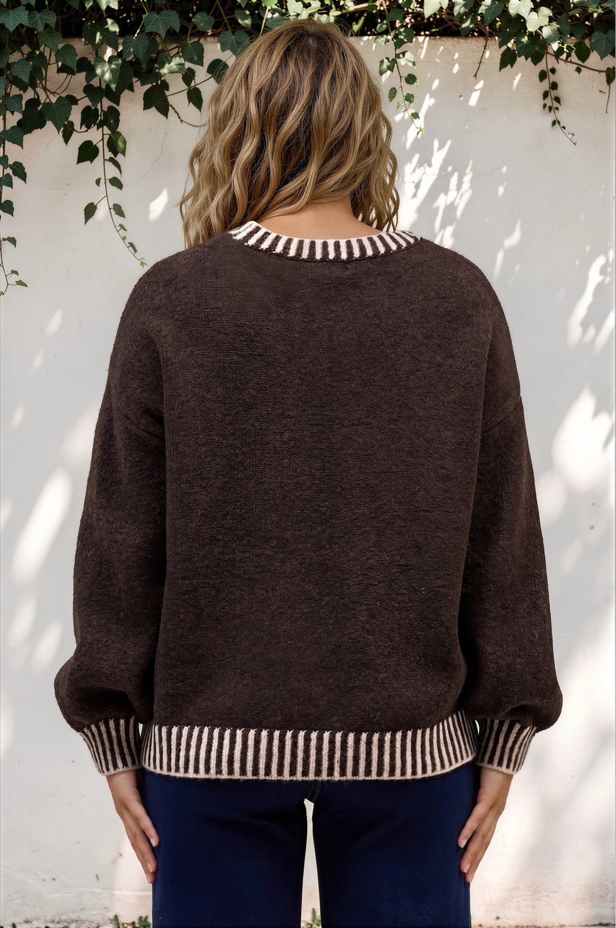 Model wearing Aura Jumper in Chocolate from Salty Crush