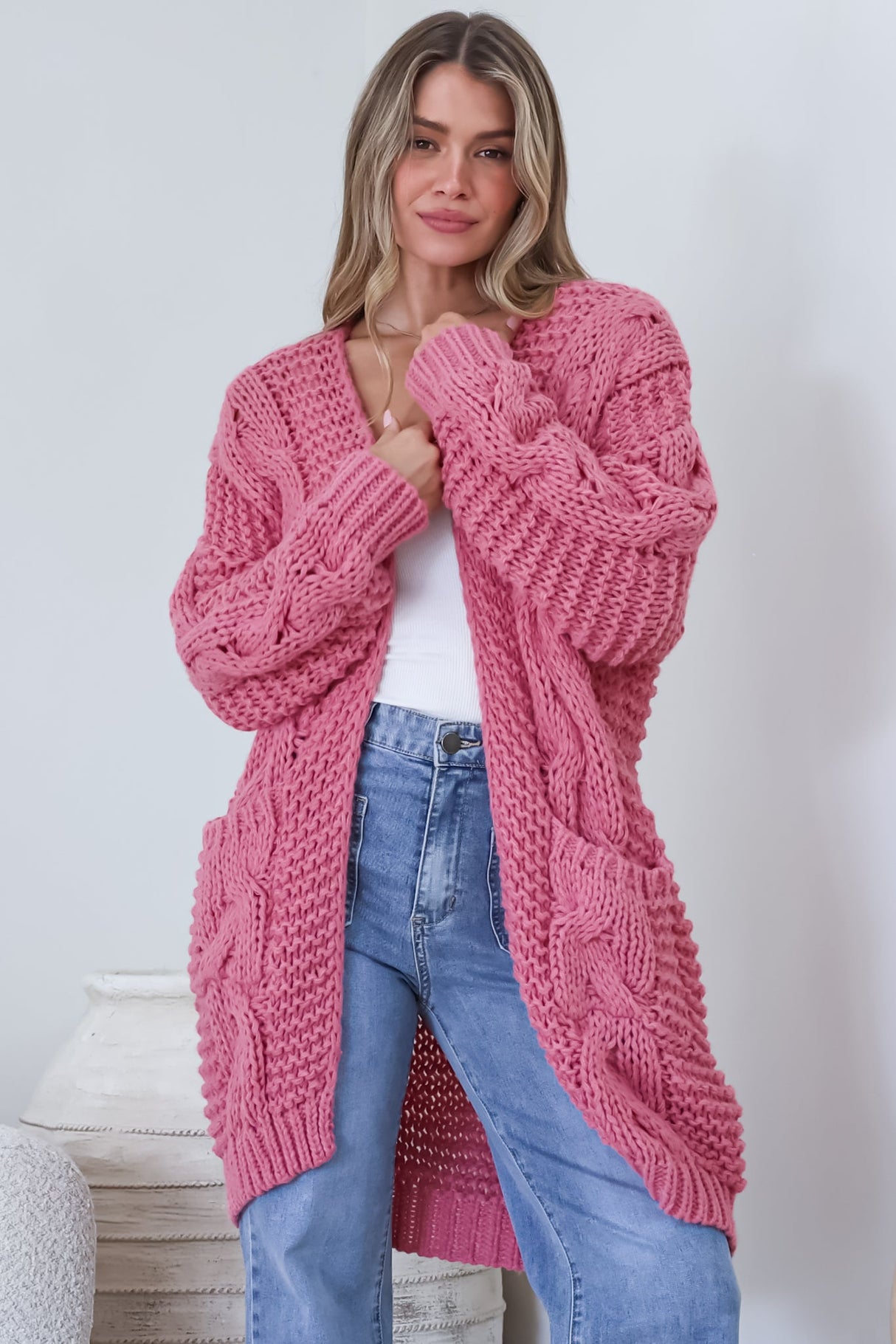 Model wearing Beckett Cardigan in Pink from Salty Crush