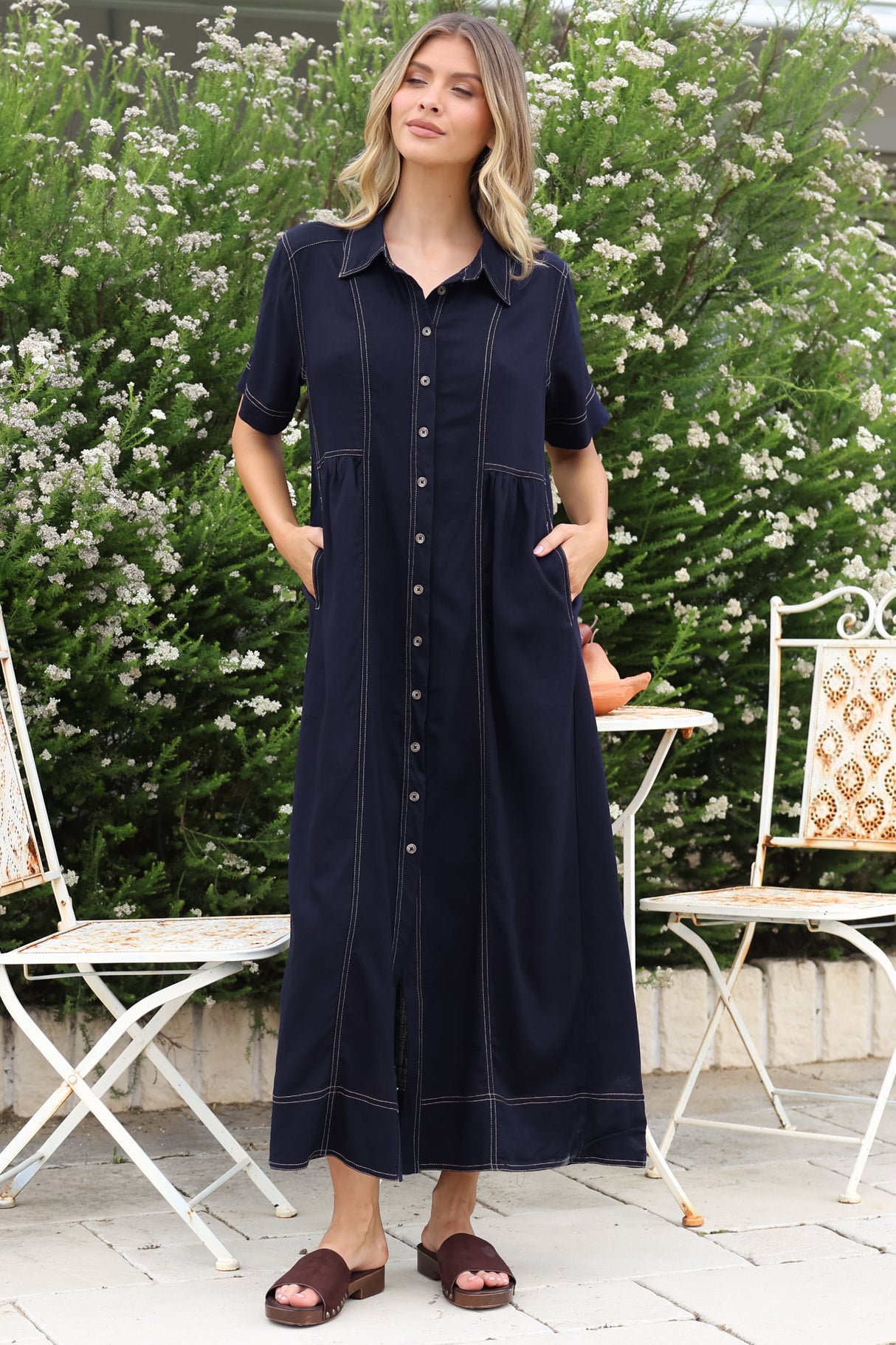 Model wearing Bento Midi Dress in Indigo from Salty Crush