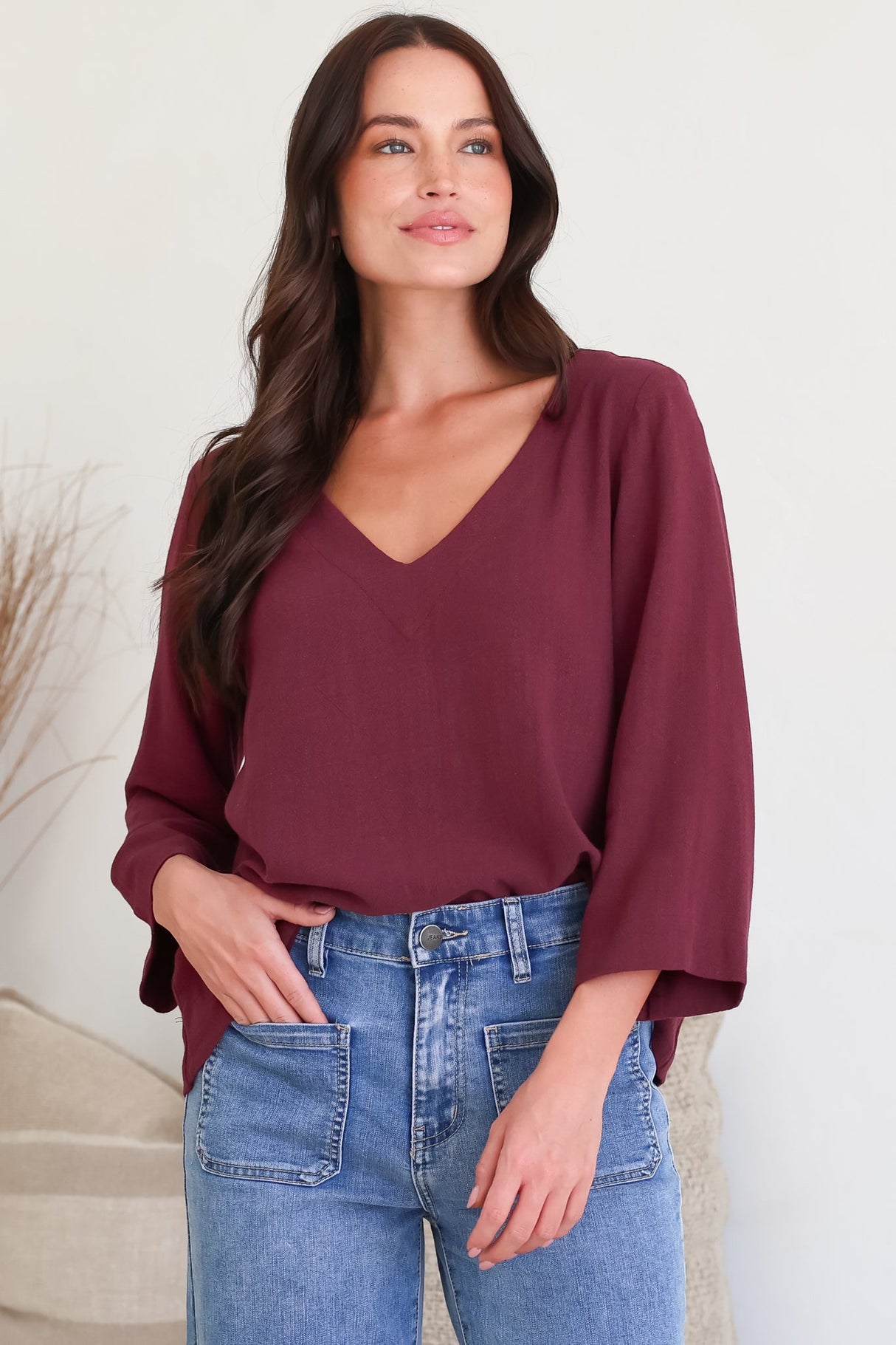 Breezer Top - Long Sleeve V Neck Pull Over Top with High Low Hemline in Wine