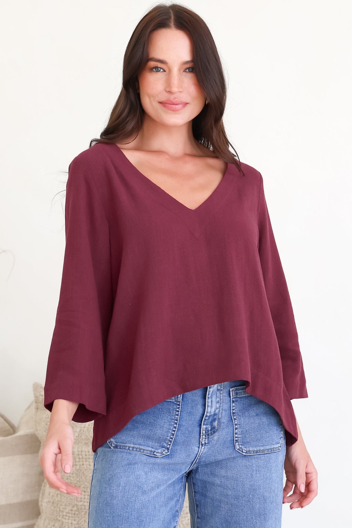 Breezer Top - Long Sleeve V Neck Pull Over Top with High Low Hemline in Wine
