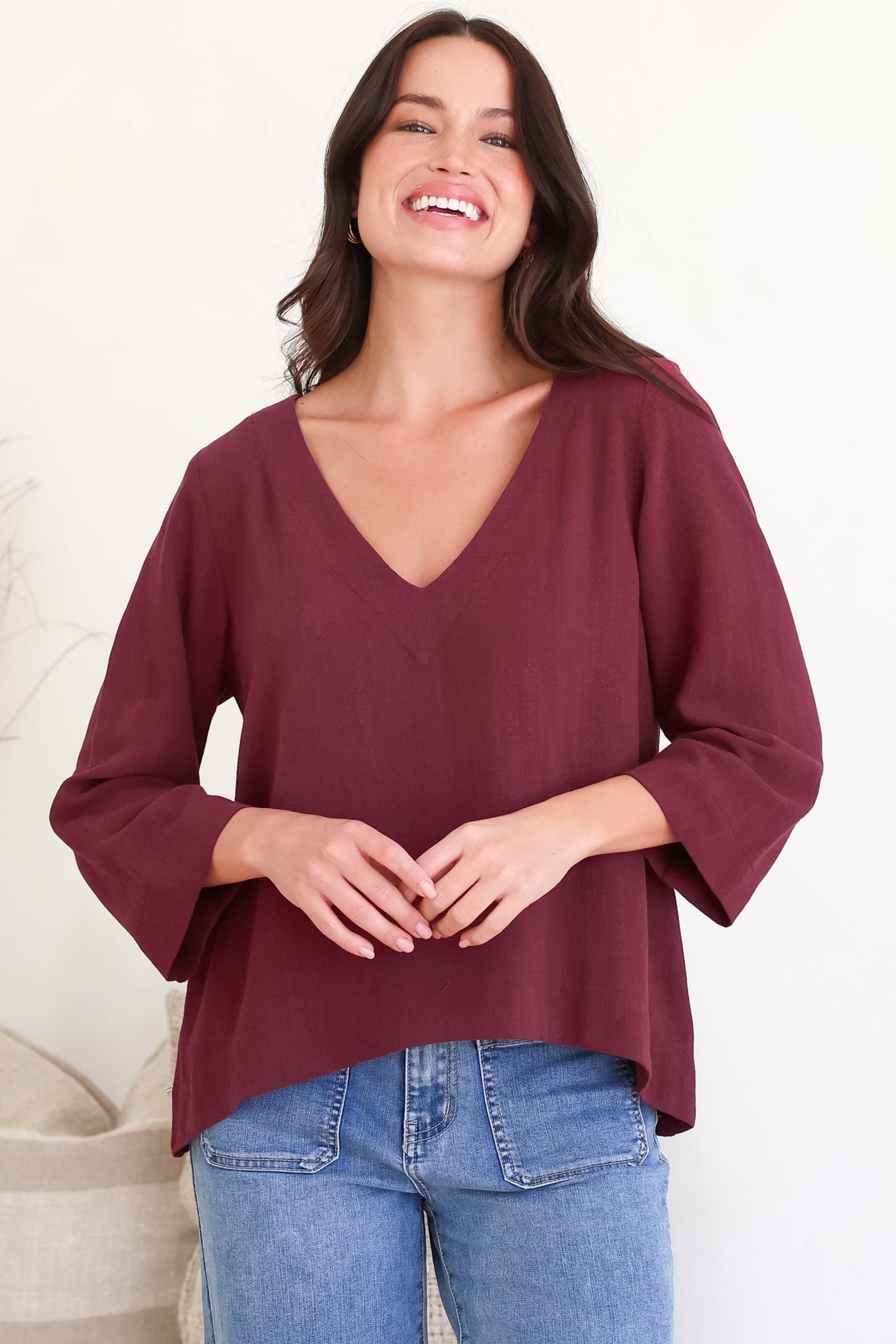 Breezer Top - Long Sleeve V Neck Pull Over Top with High Low Hemline in Wine