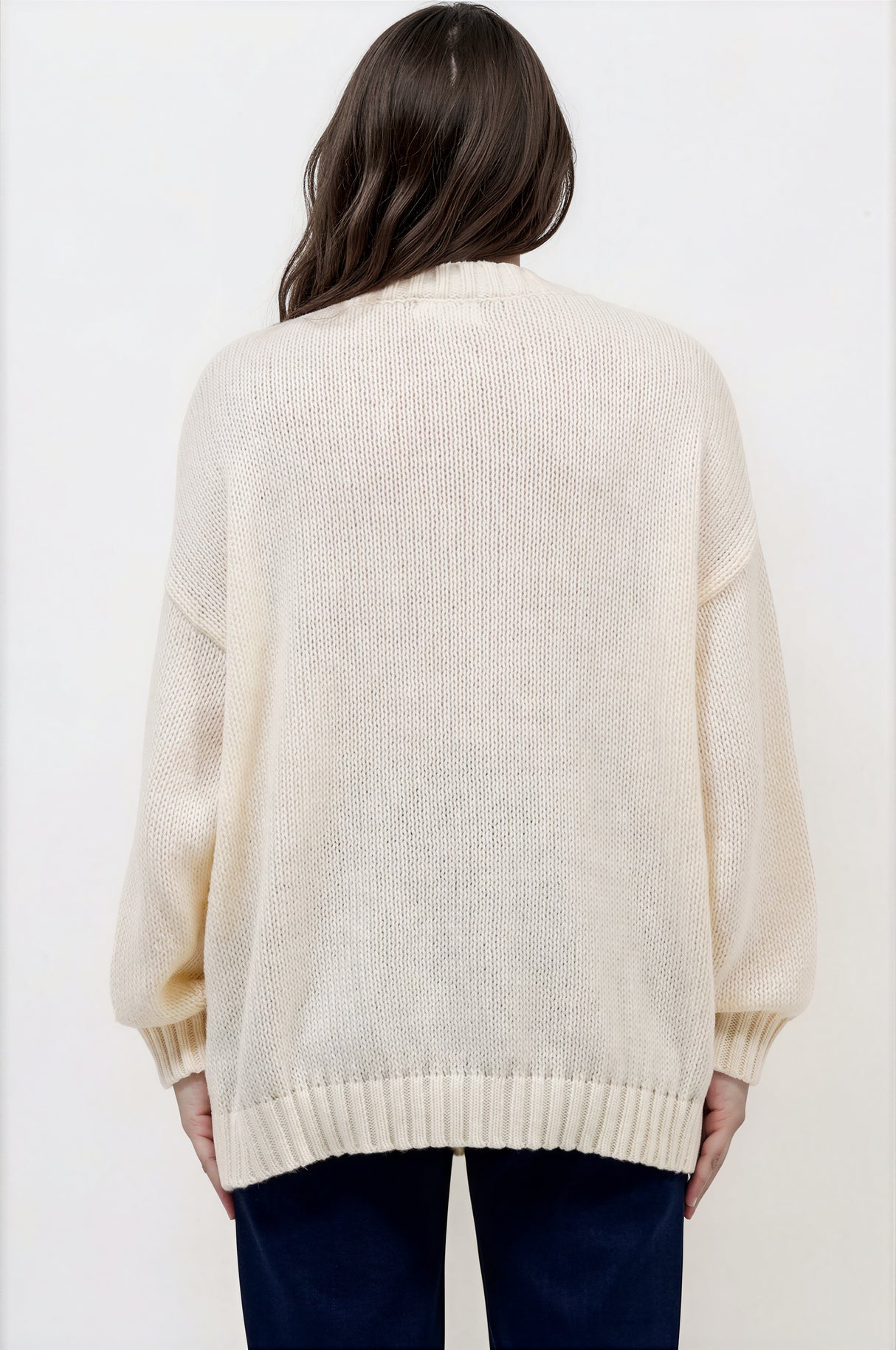 Model wearing Caesar Jumper in Beige from Salty Crush