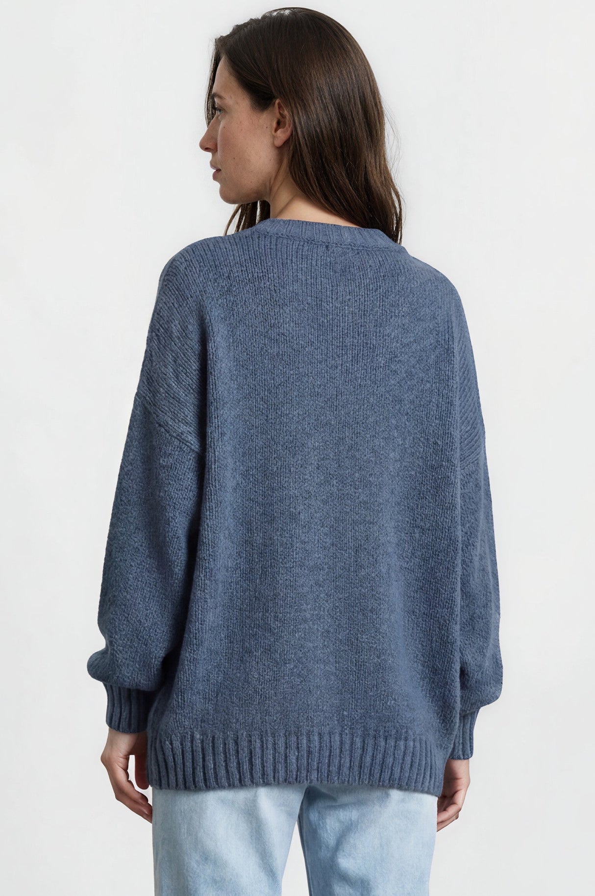 Model wearing Caesar Jumper in Blue from Salty Crush