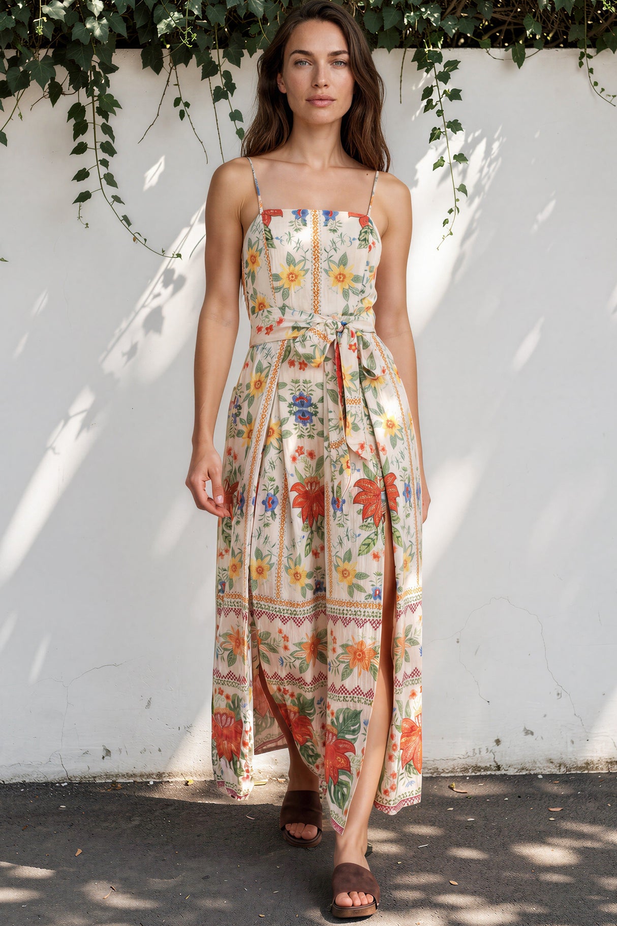 Model wearing Citrine Jumpsuit in Alma Print from Salty Crush