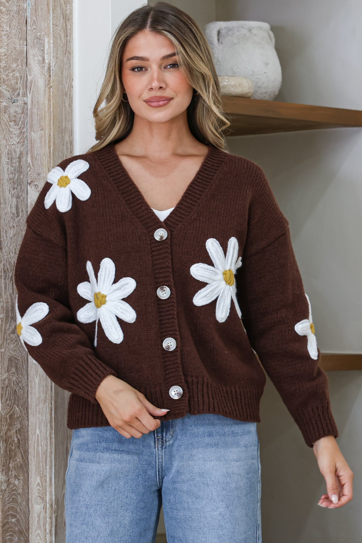 Model wearing Daisy Belle Cardigan in Coffee from Salty Crush