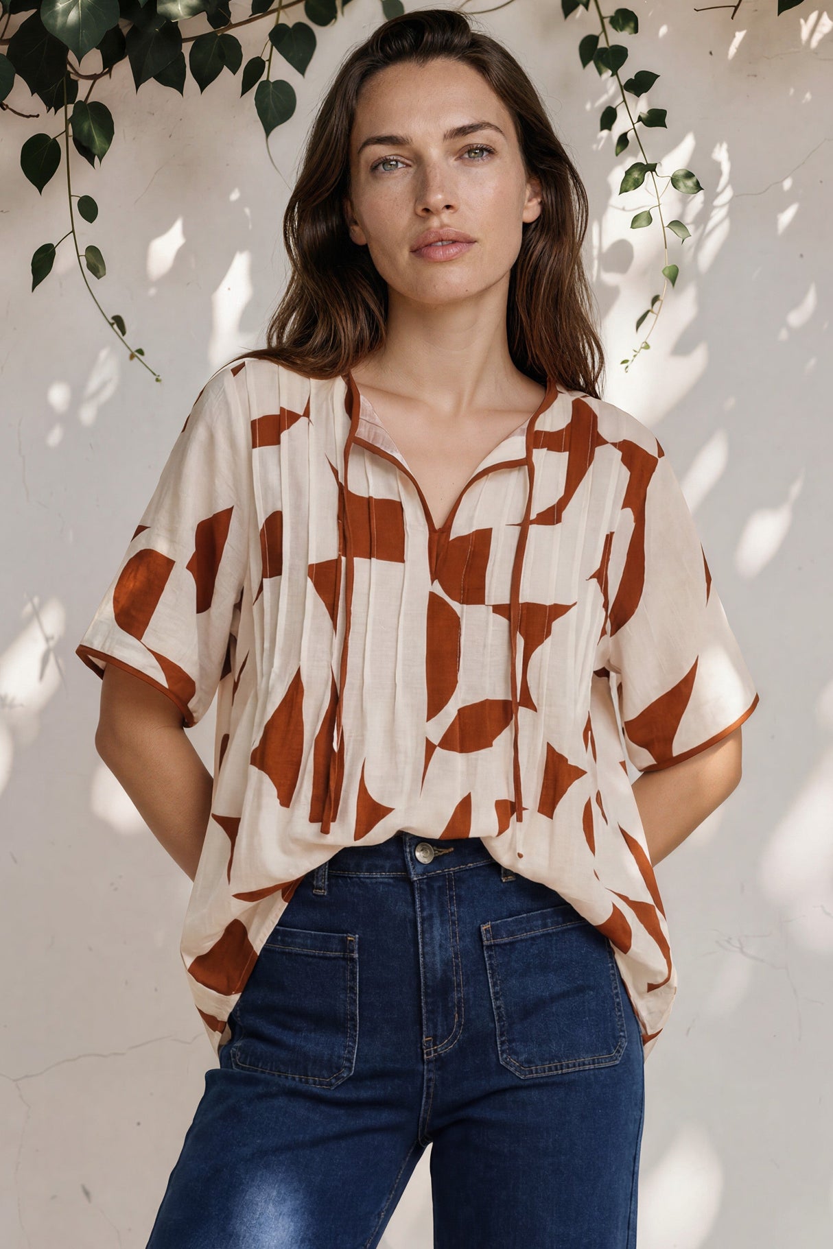 Model wearing Druitt Top in Oasis Print from Salty Crush