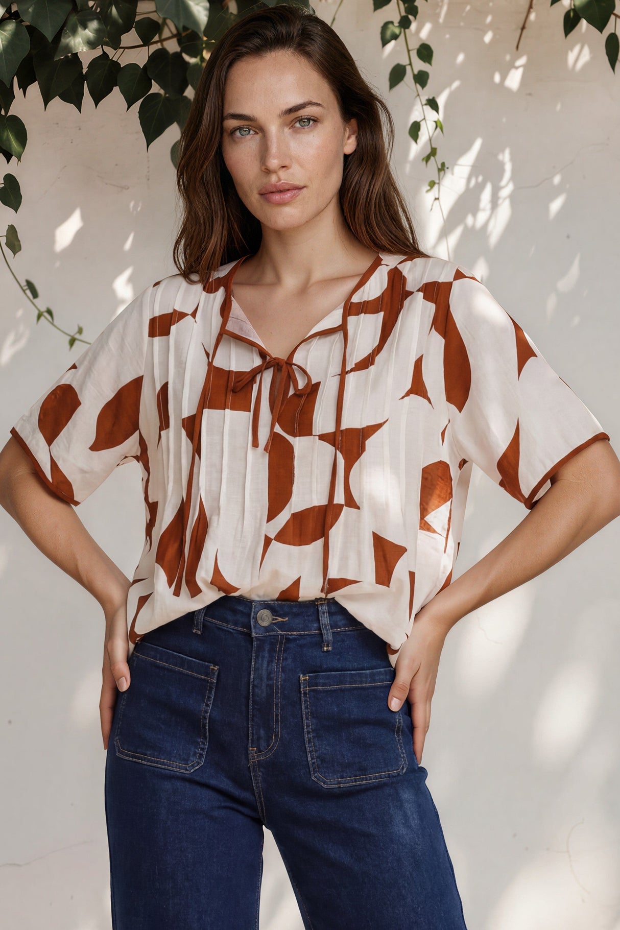 Model wearing Druitt Top in Oasis Print from Salty Crush