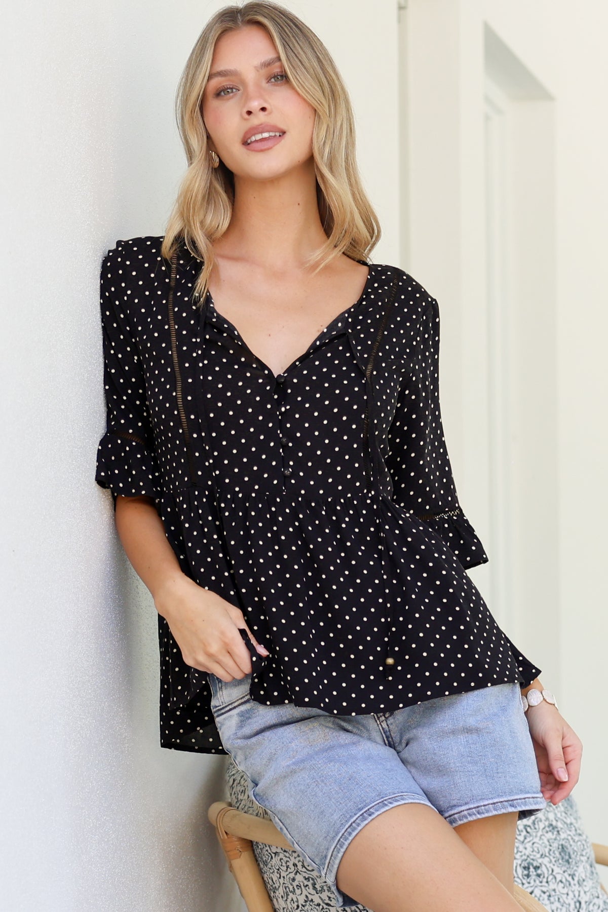 Dustin Top - Tie Neck Button Bodice Peplum Top with Frill Cuff 3/4 Sleeves in Spot Print Black