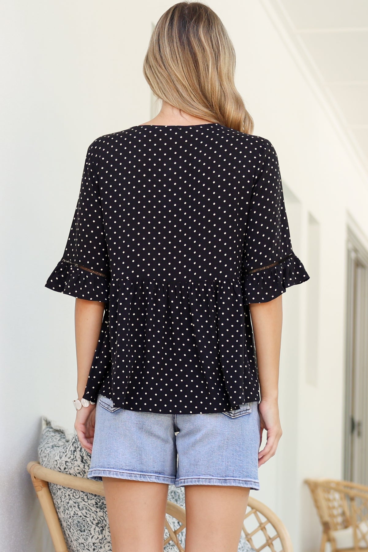Dustin Top - Tie Neck Button Bodice Peplum Top with Frill Cuff 3/4 Sleeves in Spot Print Black
