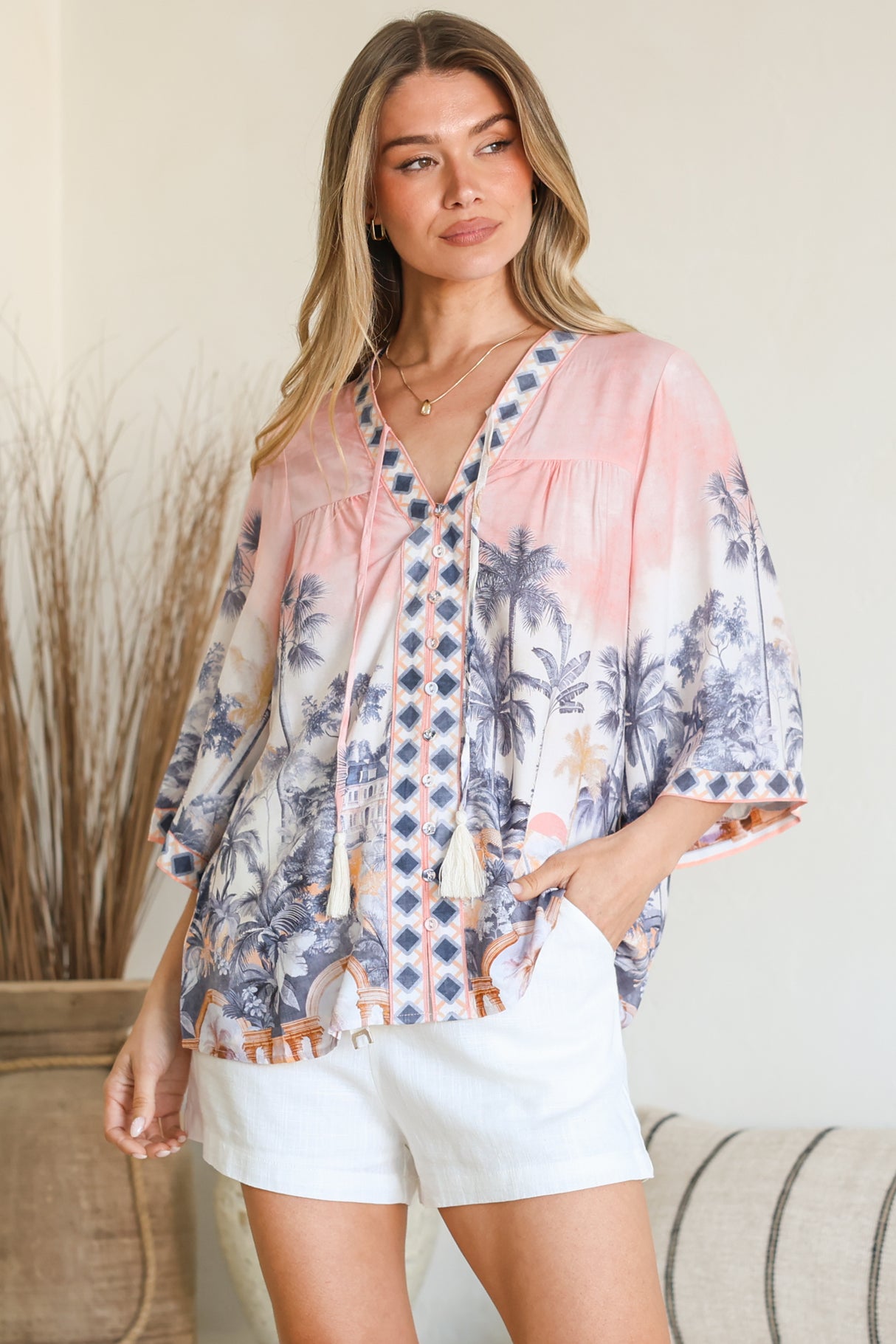 Model wearing Elysia Blouse in Armena Print from Salty Crush