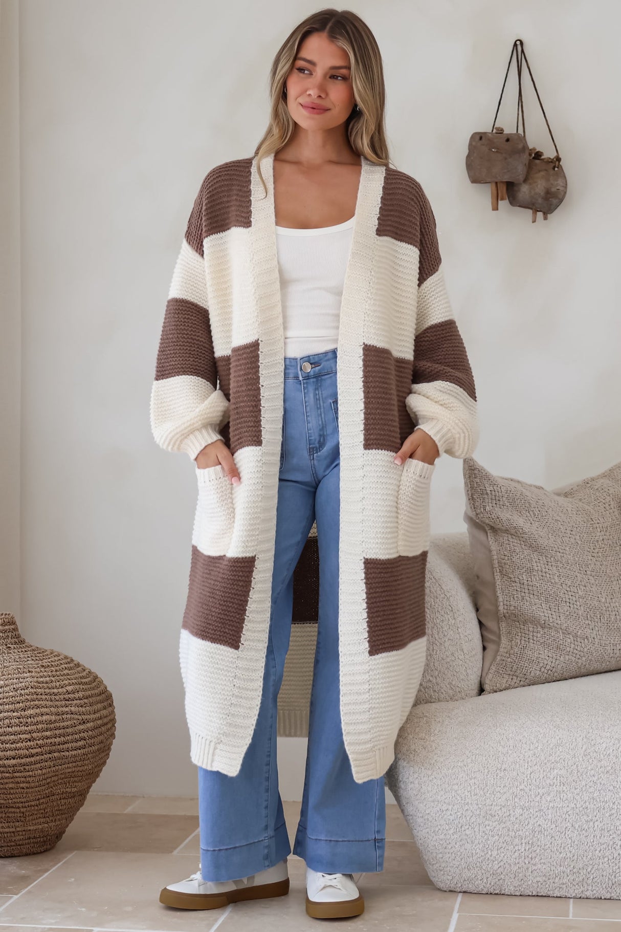 Model wearing Finneas Cardigan in Brown from Salty Crush