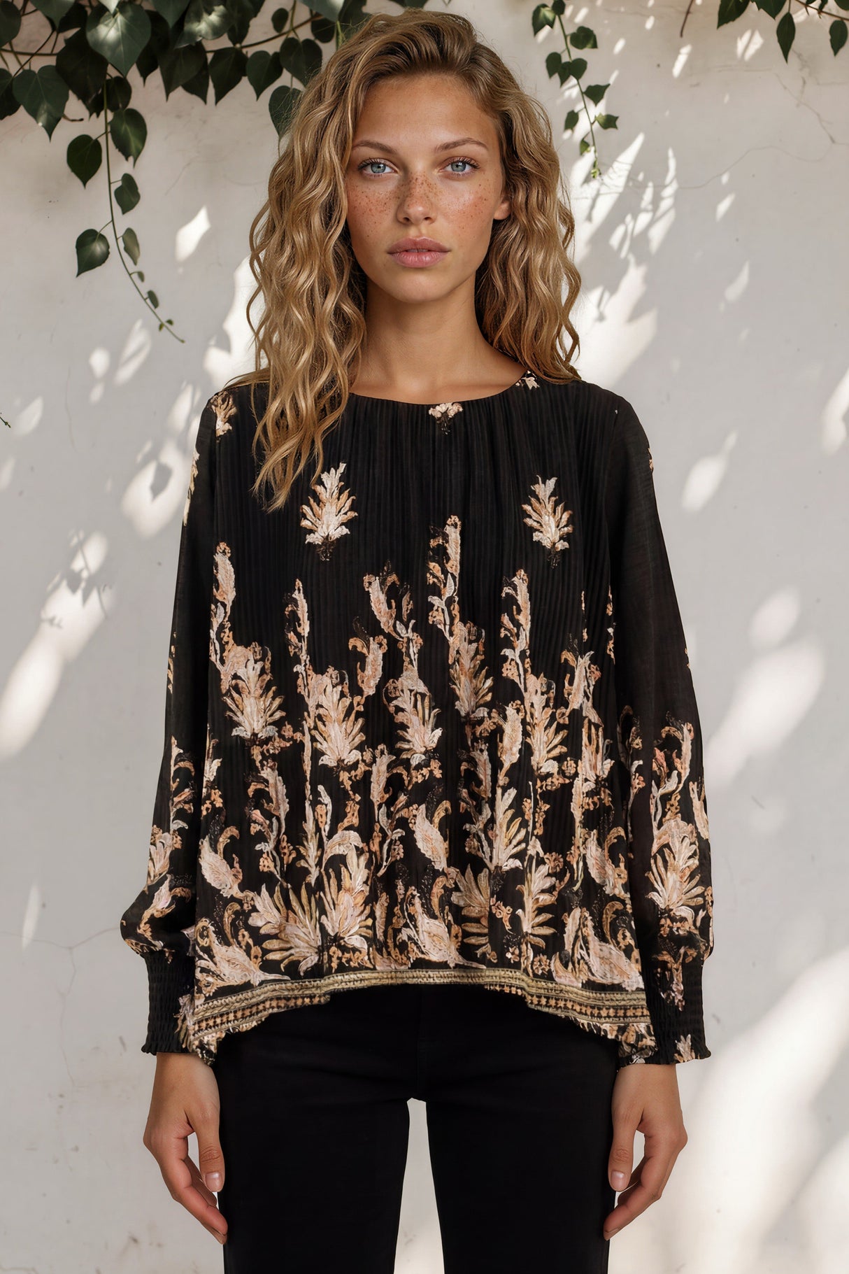 Model wearing Gelina Top in Lynsey Print Black from Salty Crush