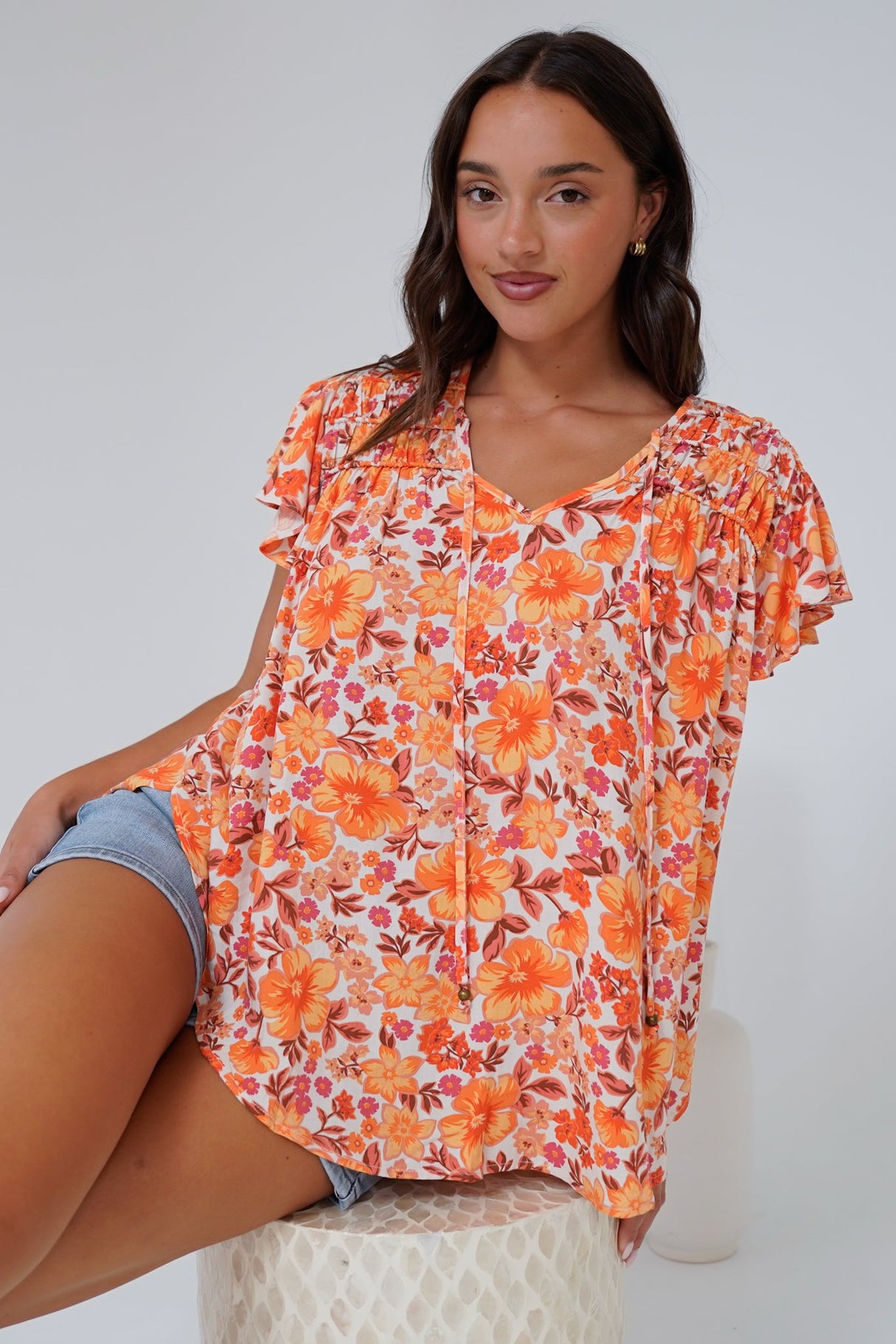Giada Top - Flutter Sleeve High-Low Scoop Hem Top in Mahendra Print