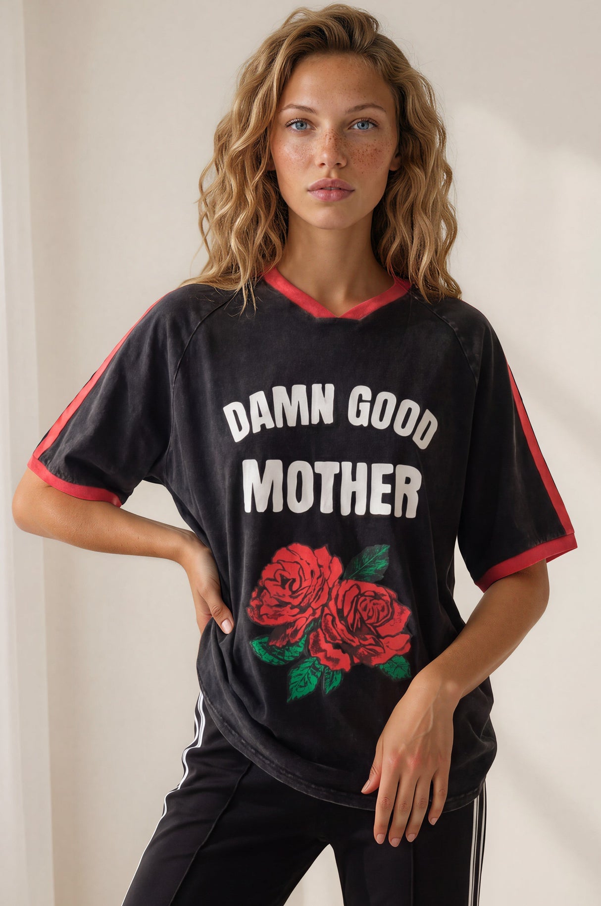 Model wearing Good Mother Tee in Black from Salty Crush