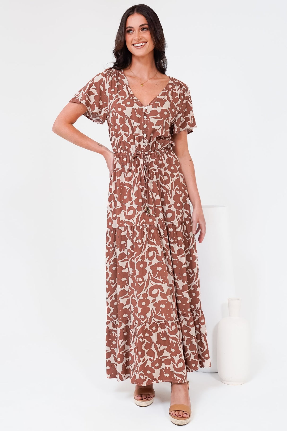 Model wearing Hanna Maxi Dress in Emma Jade Print Brown from Salty Crush