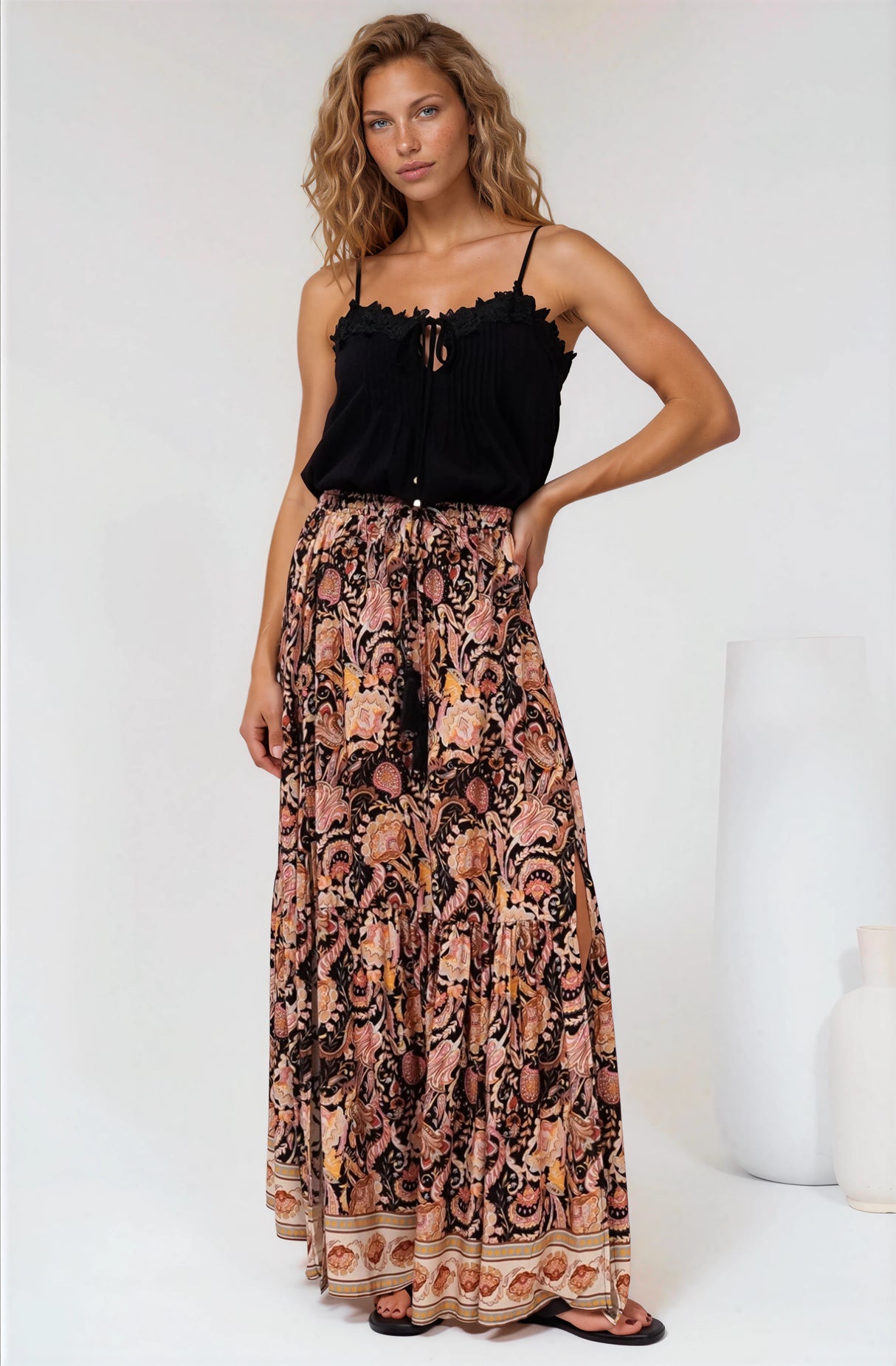 Model wearing Hellen Maxi Skirt in Pree Print Black from Salty Crush