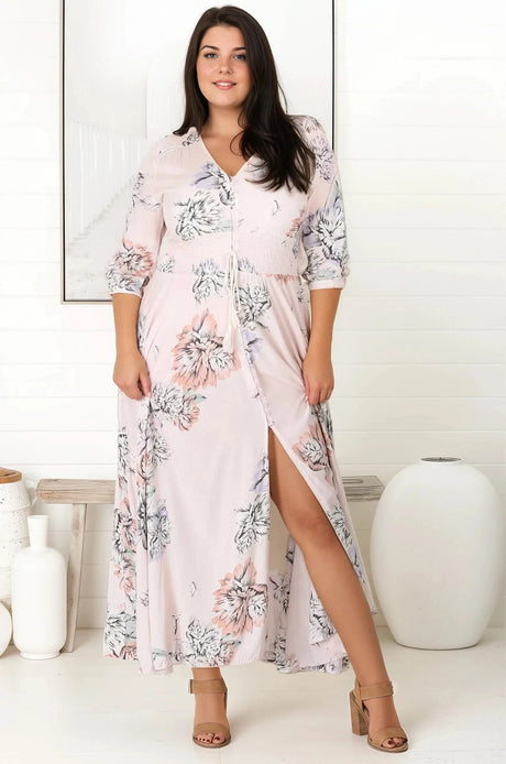 JAASE - Indiana Maxi Dress: Lace Back Shirred Waist A Line Dress with Handkerchief Hemline in Blooming Bouquet Print
