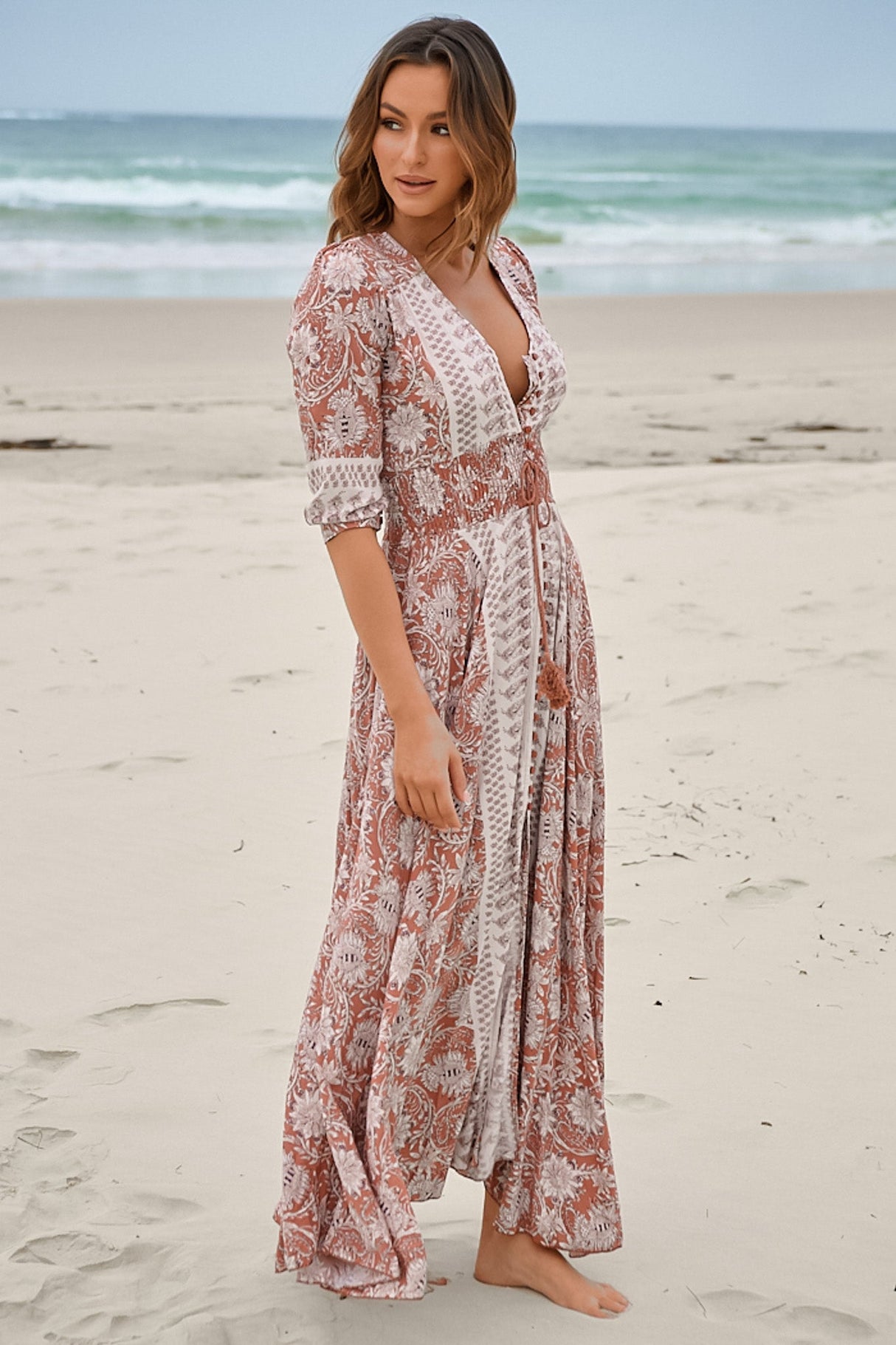 JAASE - Indiana Maxi Dress: Lace Back Shirred Waist A Line Dress with Handkerchief Hemline in Indah Print