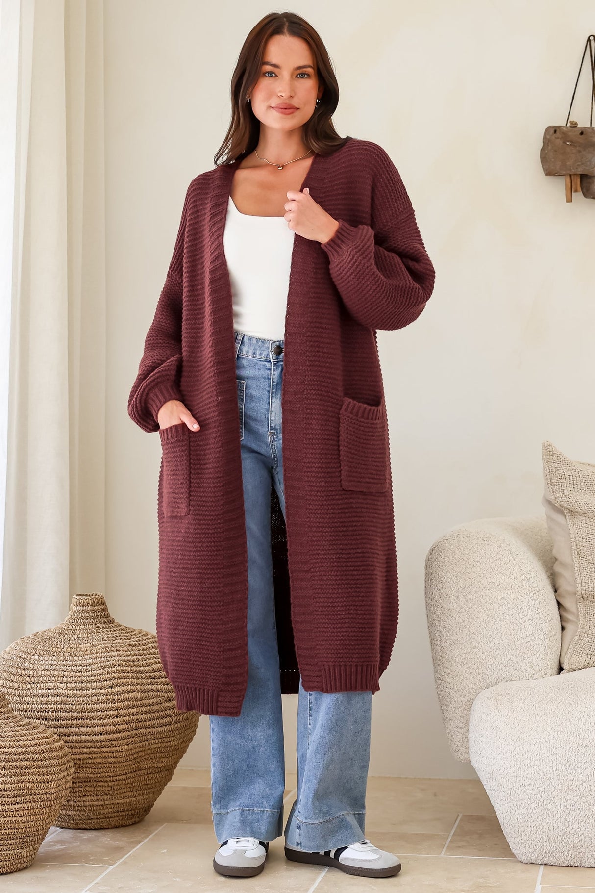 Model wearing Jacky Cardigan in Wine from Salty Crush