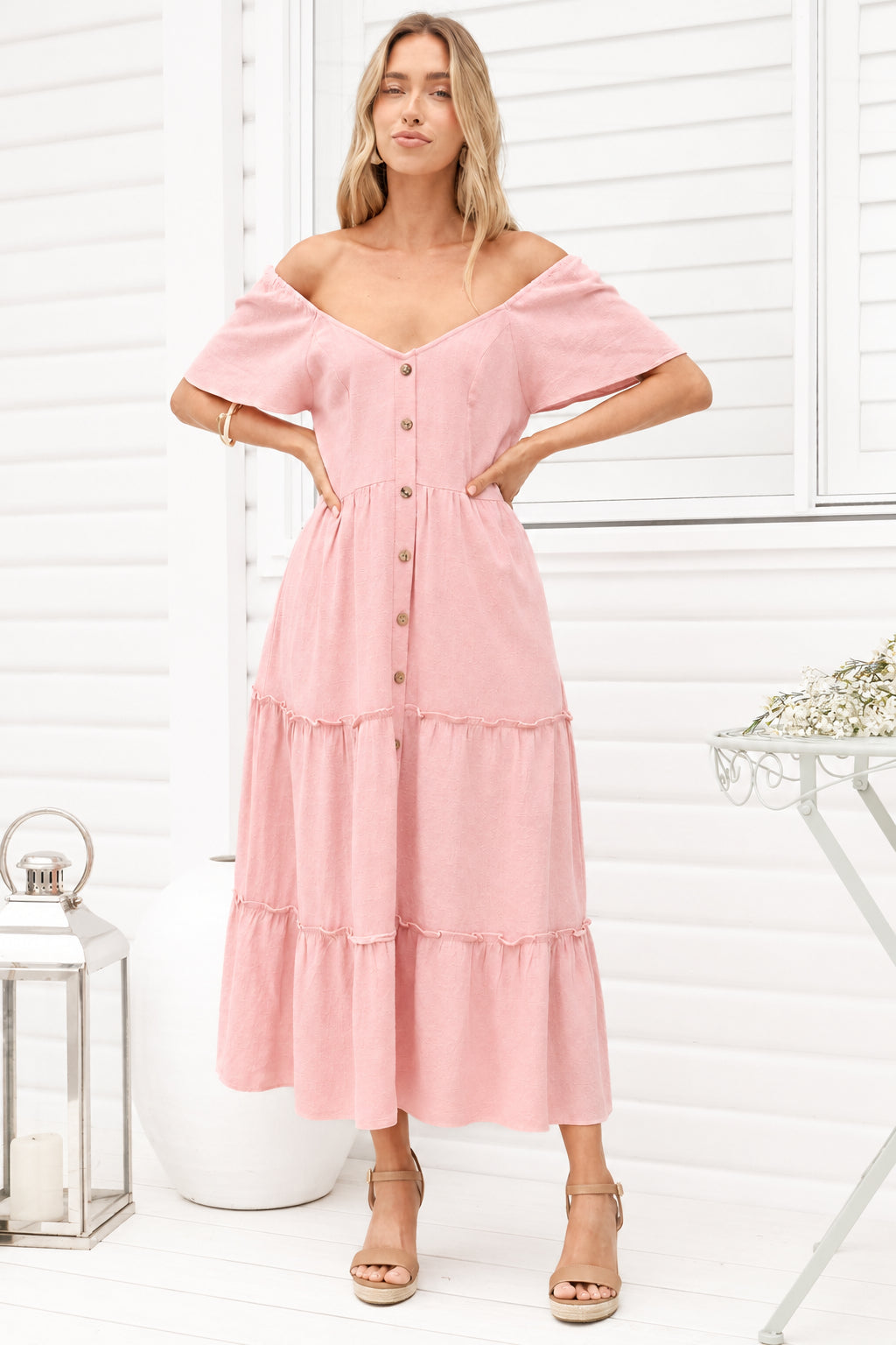 Model wearing Karina Midi Dress in Pink from Salty Crush