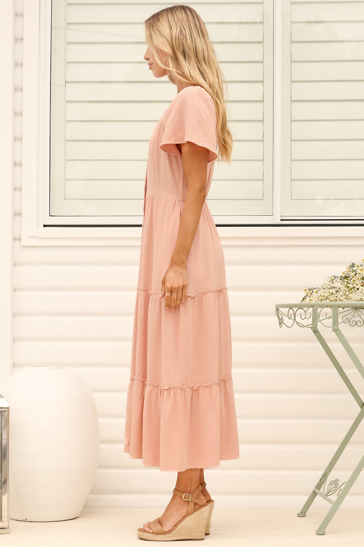 Model wearing Karina Midi Dress in Pink from Salty Crush