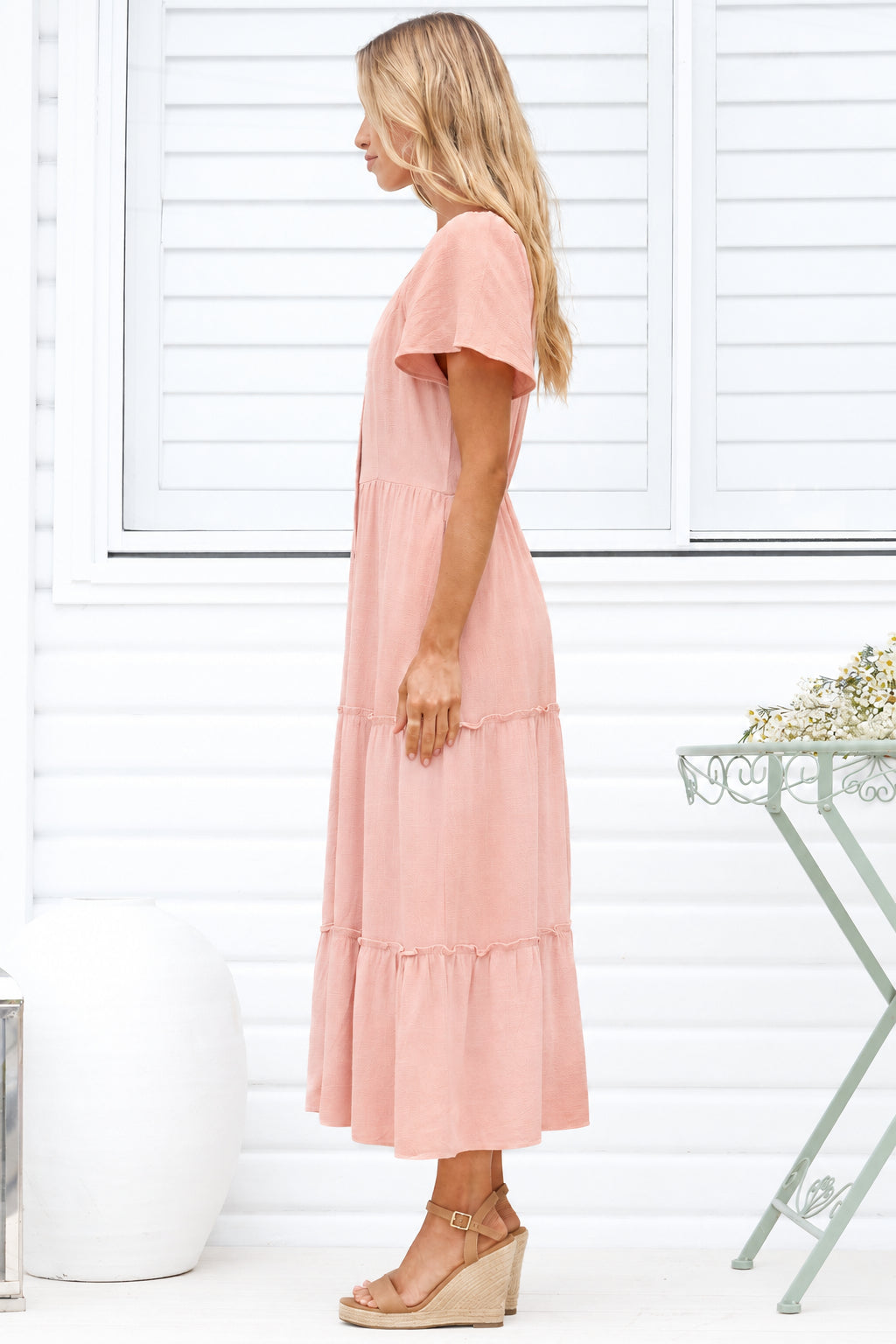 Model wearing Karina Midi Dress in Pink from Salty Crush