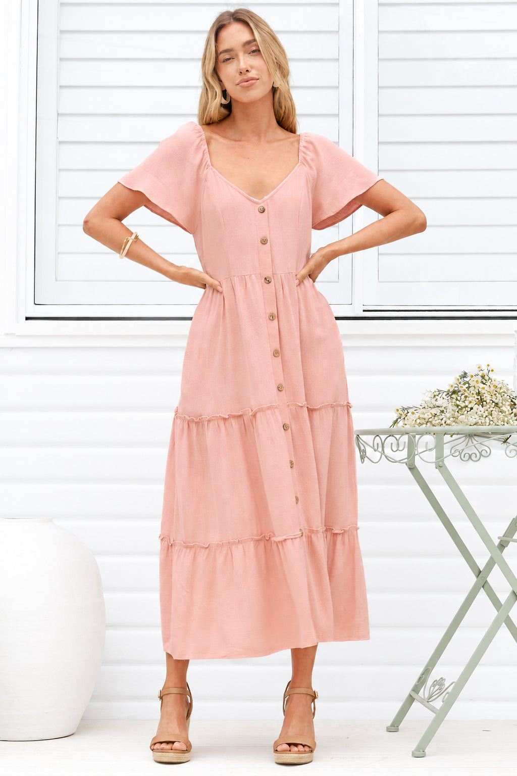 Model wearing Karina Midi Dress in Pink from Salty Crush