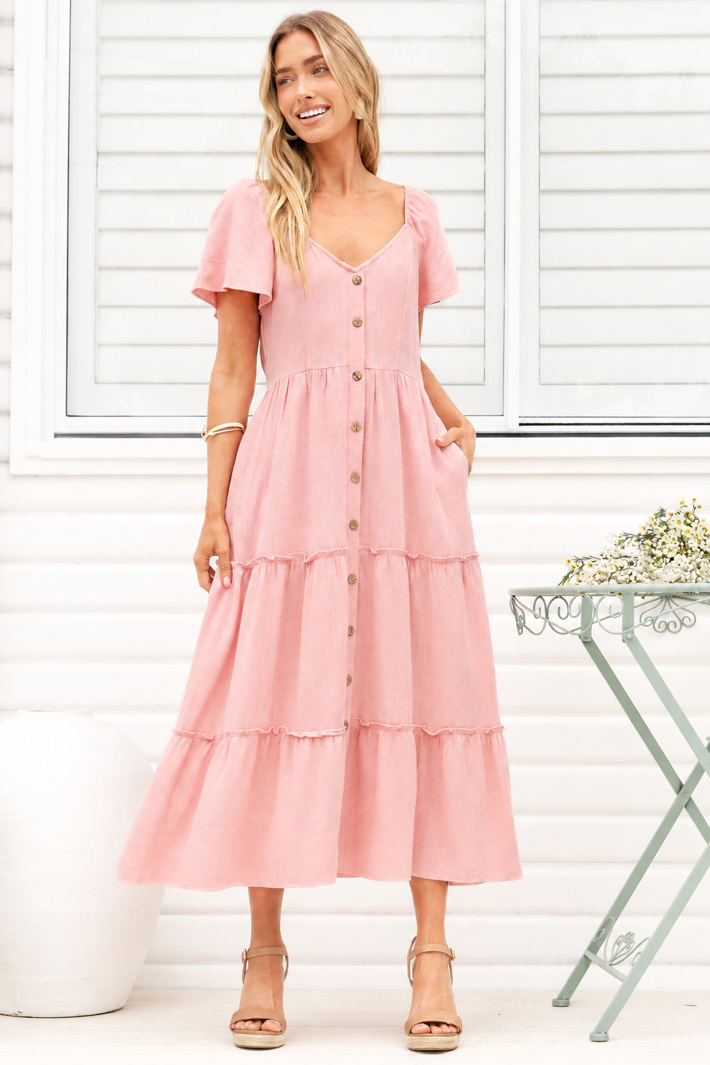 Model wearing Karina Midi Dress in Pink from Salty Crush