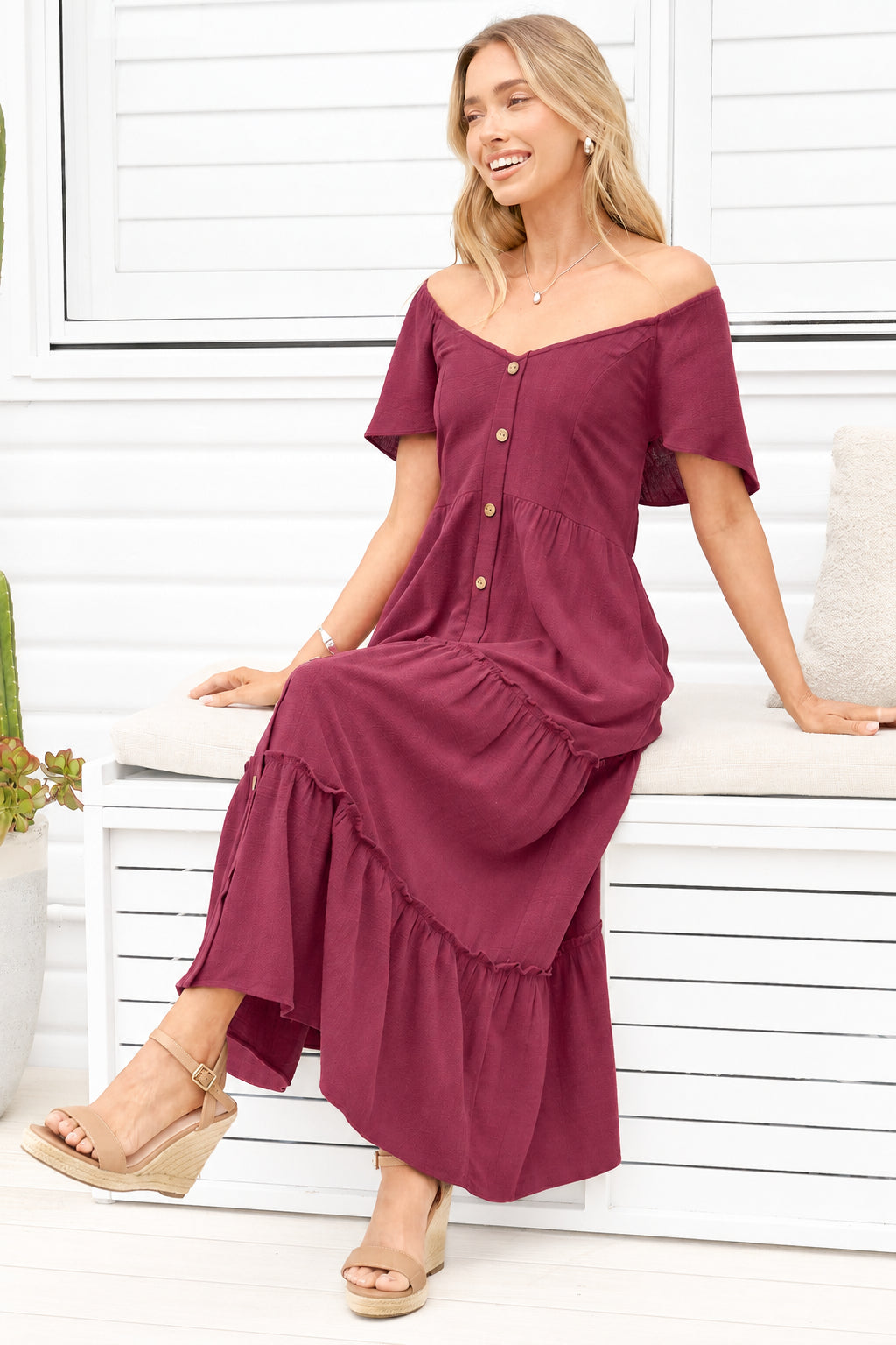 Model wearing Karina Midi Dress in Wine from Salty Crush