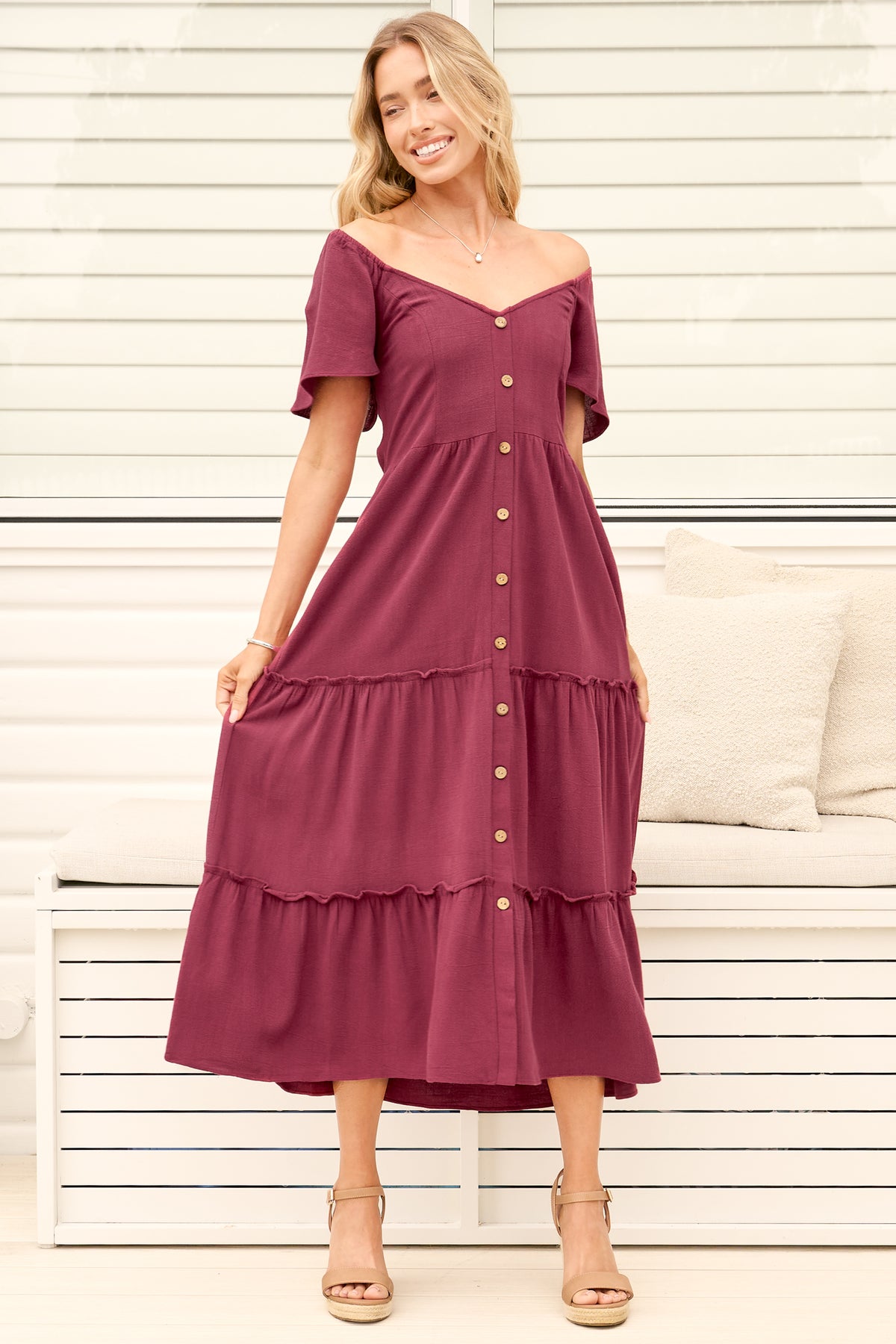 Model wearing Karina Midi Dress in Wine from Salty Crush