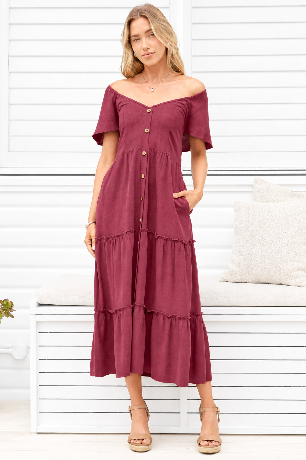 Model wearing Karina Midi Dress in Wine from Salty Crush