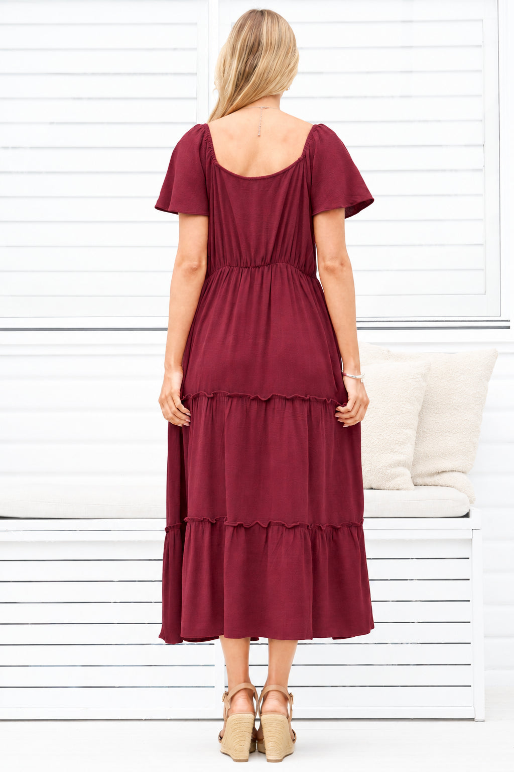 Model wearing Karina Midi Dress in Wine from Salty Crush