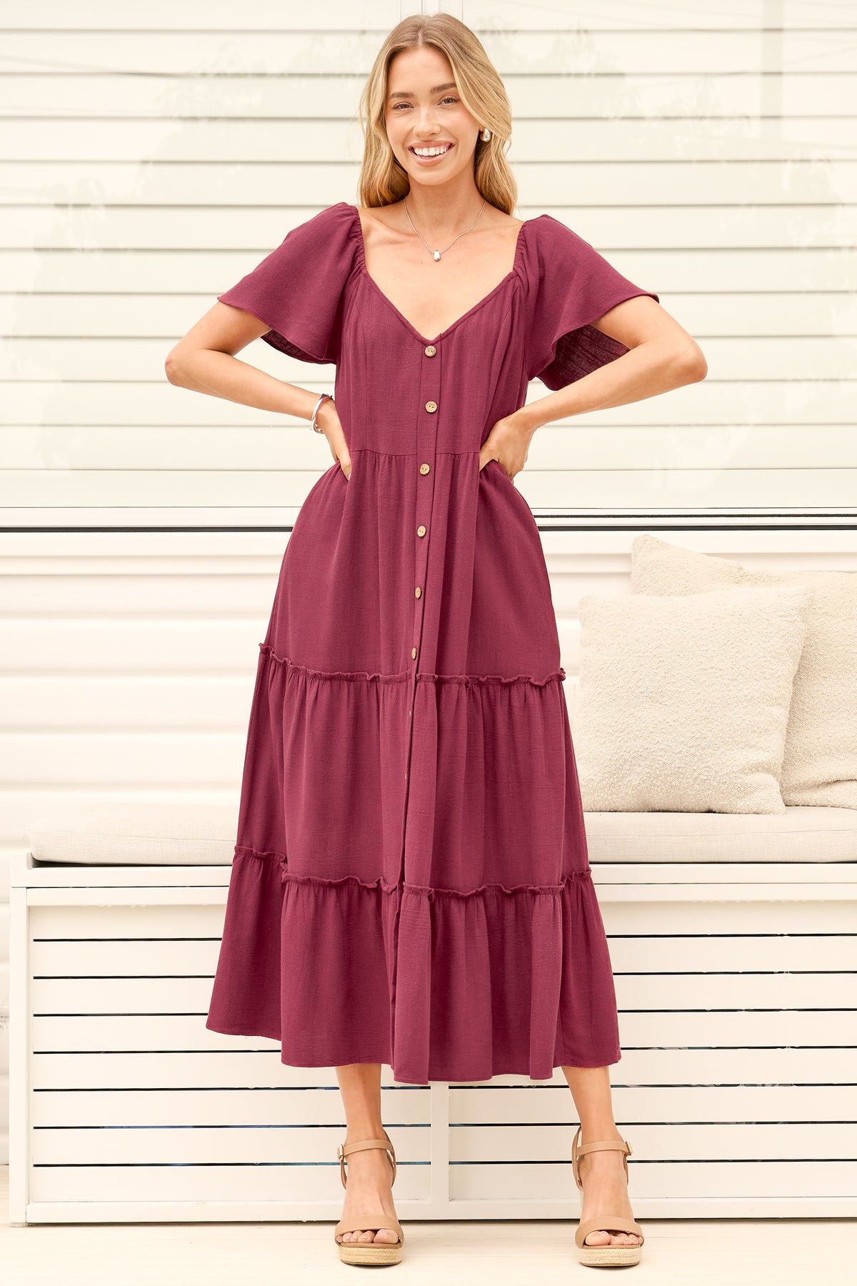 Model wearing Karina Midi Dress in Wine from Salty Crush