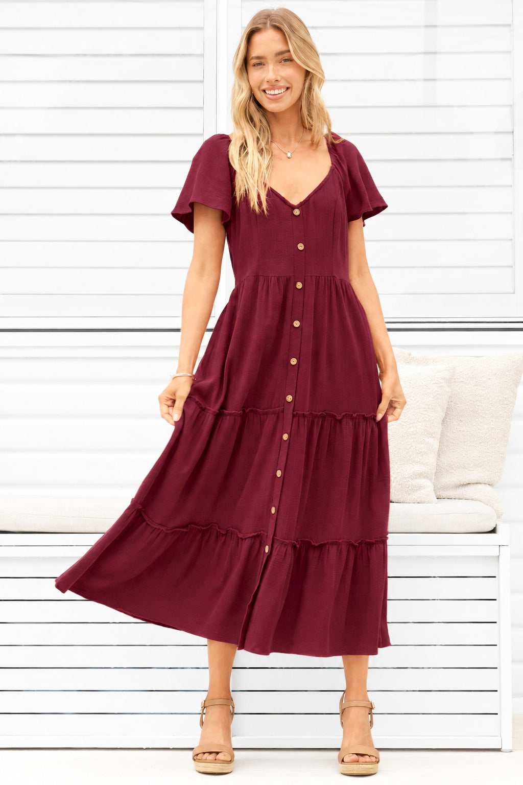 Model wearing Karina Midi Dress in Wine from Salty Crush