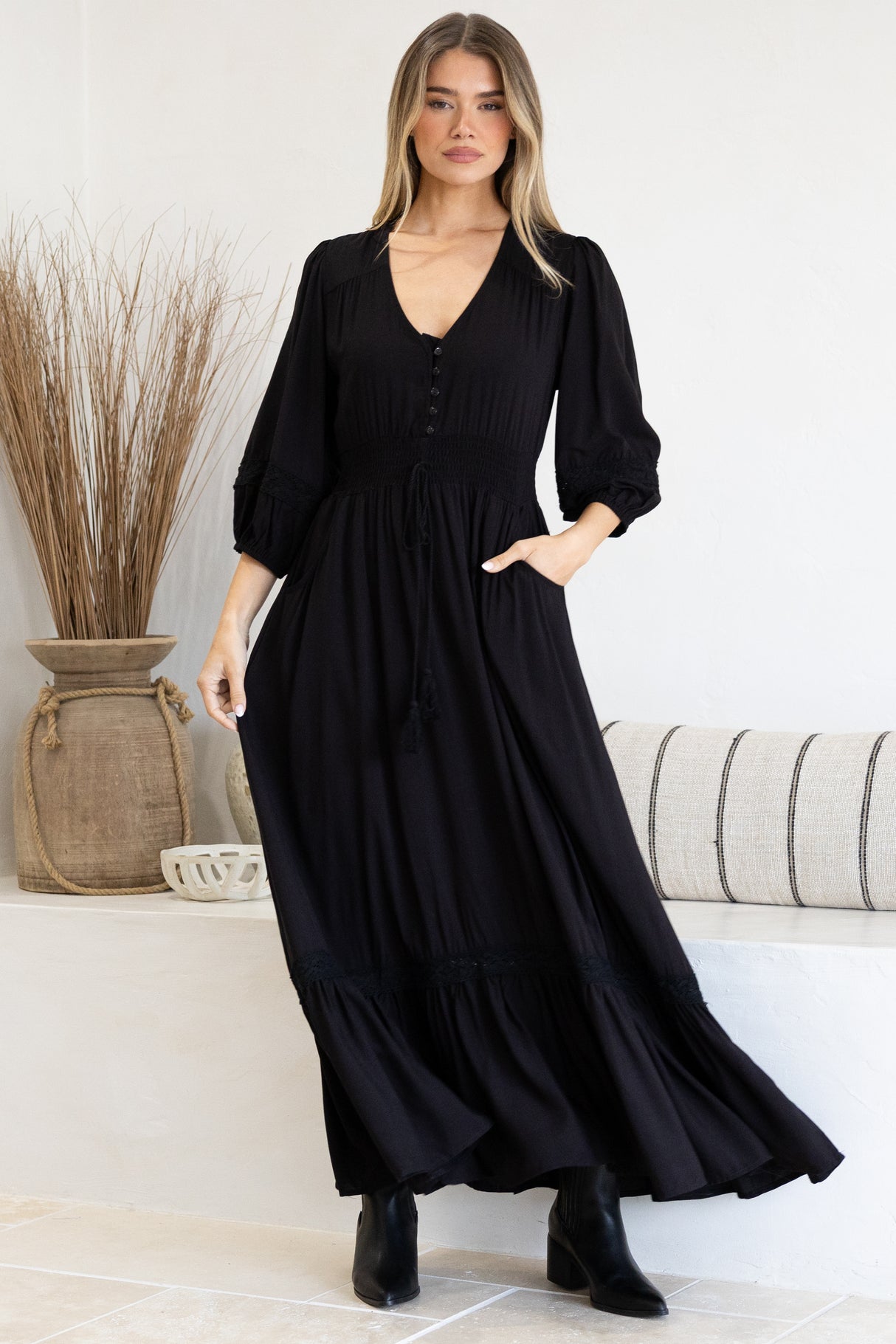 Model wearing Kiaba Maxi Dress in Black from Salty Crush