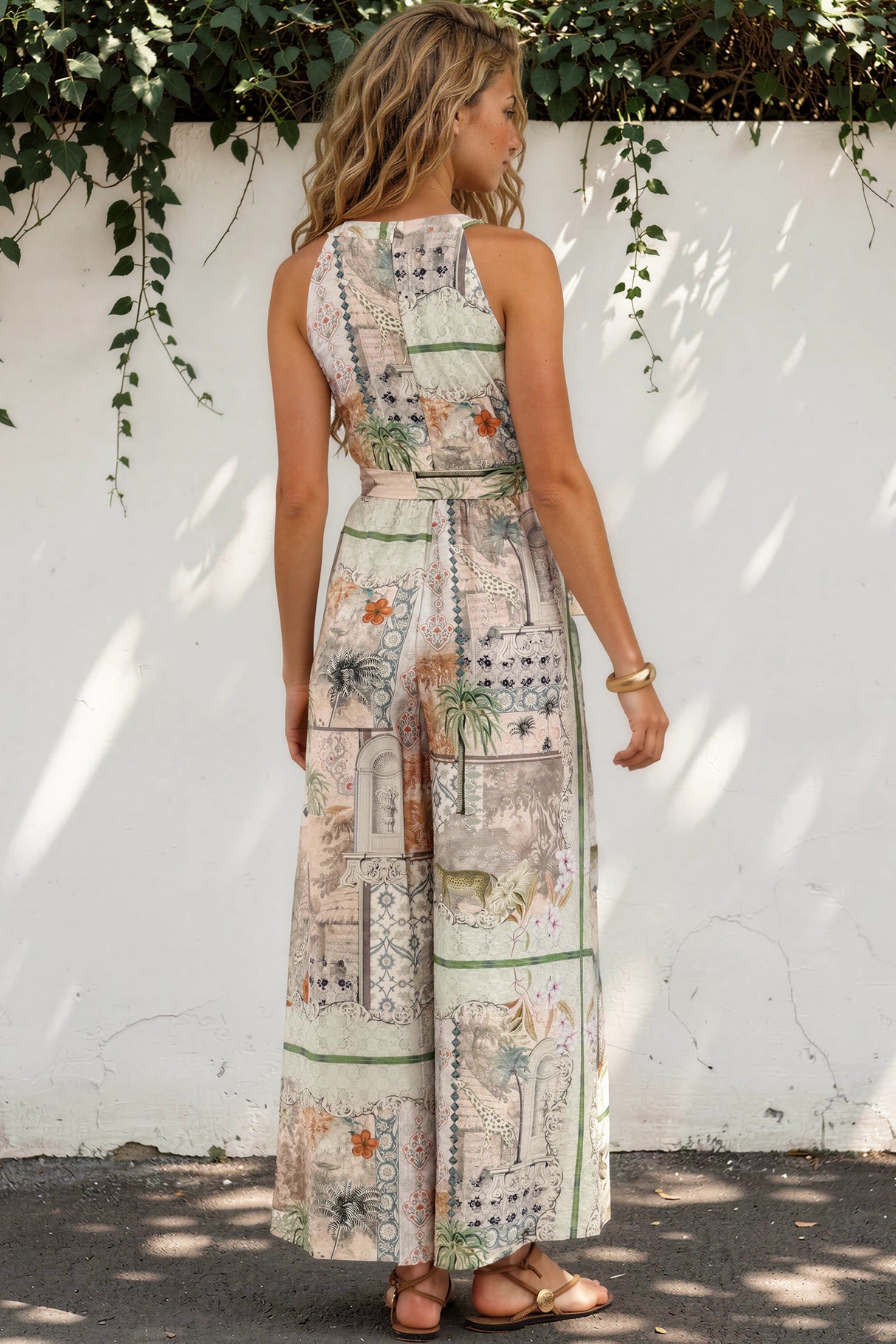 Model wearing Lira Jumpsuit in Tempest Print from Salty Crush