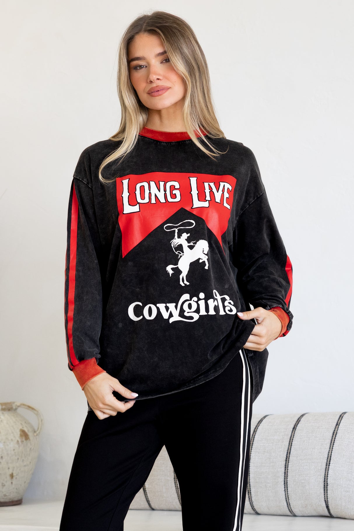 Model wearing Long Live Cowgirls Long Sleeve Tee in Black from Salty Crush