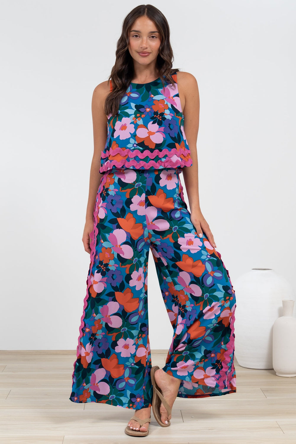 Luchia Jumpsuit - Sleeveless Overlay Bodice Jumpsuit with Ric Rac Trims in Florabelle Print