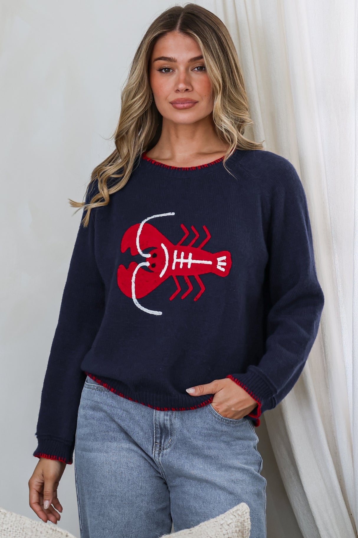 Model wearing Maine Jumper in Navy from Salty Crush