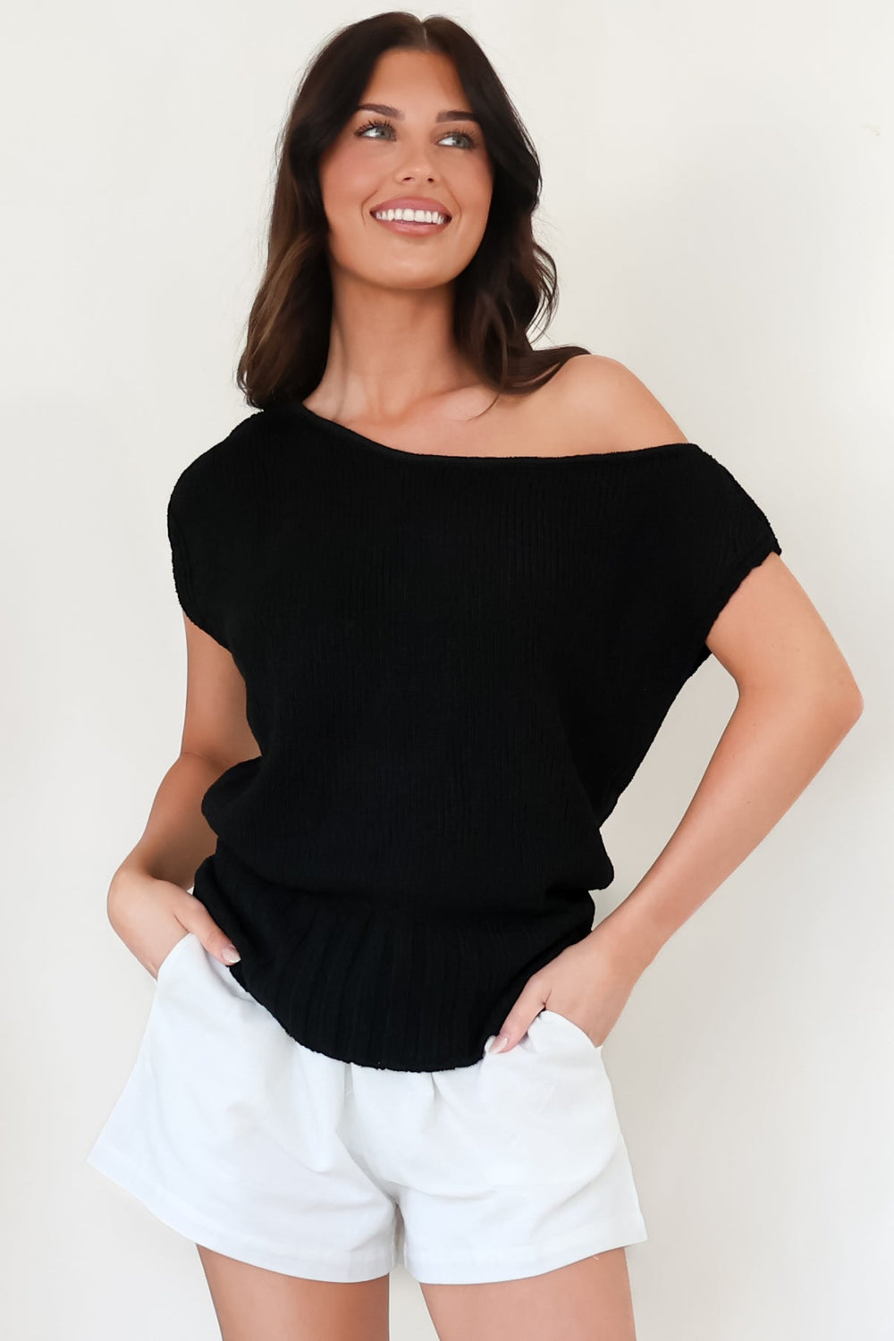 Mariah Knit Top - Sleeveless Asymmetric Neckline Top with Ribbed Hem in Black