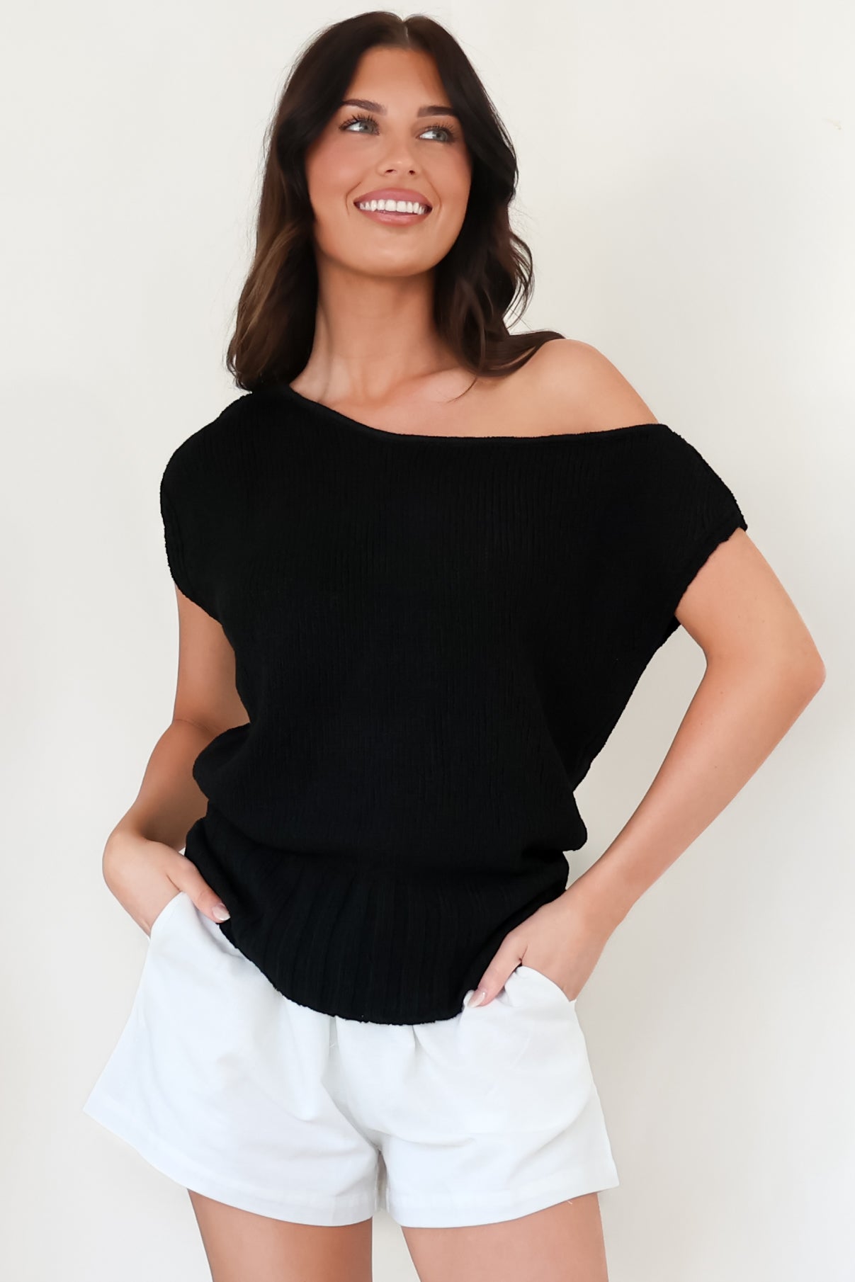 Mariah Knit Top - Sleeveless Asymmetric Neckline Top with Ribbed Hem in Black
